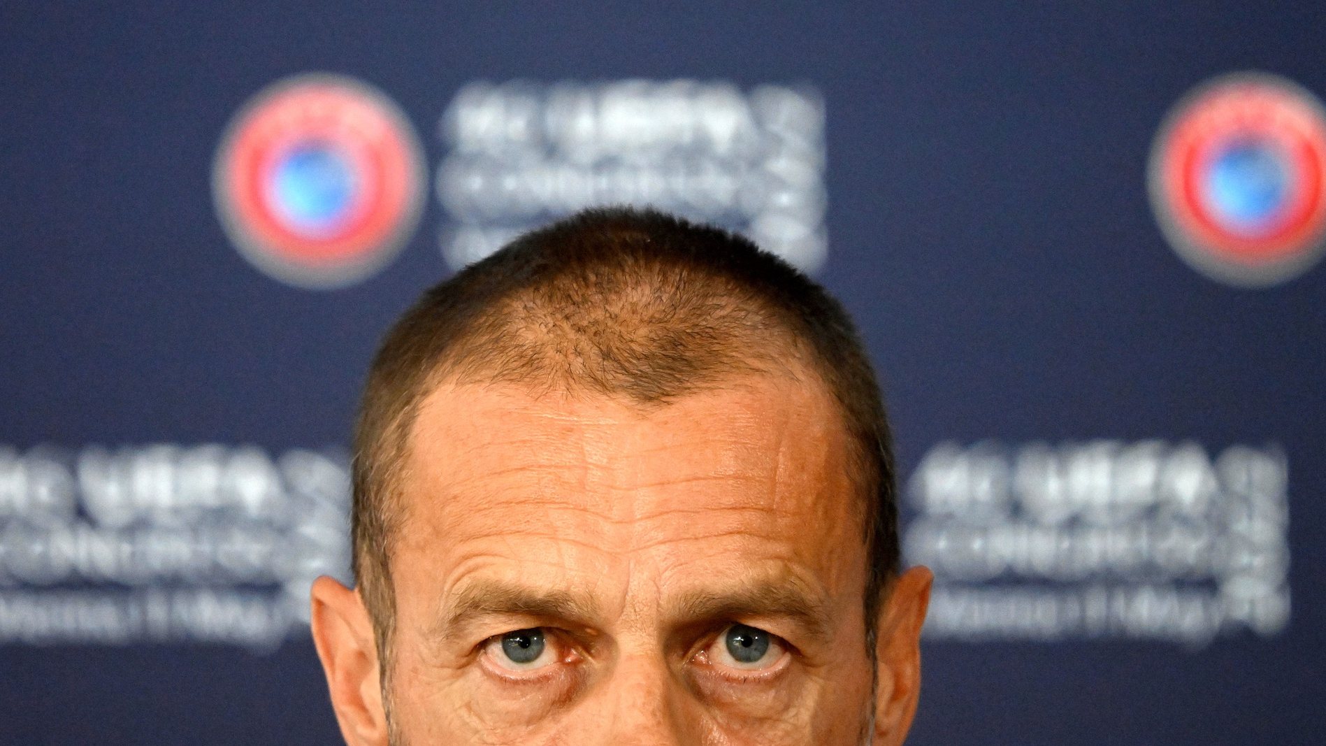 epa09939701 UEFA president Aleksander Ceferin looks on during a press conferences following the 46th Ordinary UEFA Congress in Vienna, Austria, 11 May 2022. The UEFA Executive Committee on 10 May approved the final format for the European club competitions as of the 2024/25 season. The key points for the flagship competition, the UEFA Champions League, are no more access granted based on club coefficients, eight matches instead of ten in the new league phase, an increase from 32 to 36 teams and the criteria for the allocation of the four additional places in the UEFA Champions League.  EPA/CHRISTIAN BRUNA