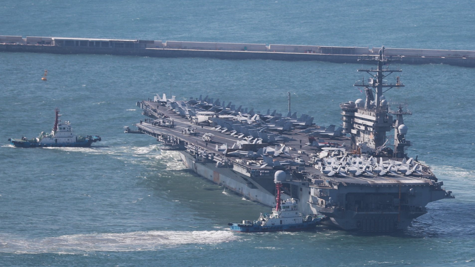 epa10554993 The US Navy&#039;s nuclear-powered aircraft carrier USS Nimitz sets sail from a naval base in Busan, South Korea, 02 April 2023.  EPA/YONHAP SOUTH KOREA OUT