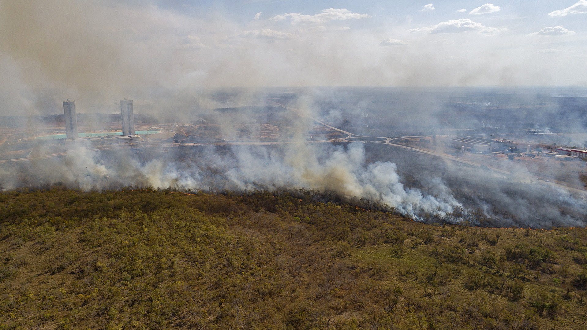 epa08604331 Aerial view of a forest fire near the city of Cuiaba, in the state of Mato Grosso, Brazil, 14 August 2020. The Brazilian Amazon, which is home to the largest tropical forest in the world, is on its way to close 2020 with a record of devastated area, after the so-called &#039;deforestation alerts&#039; have grown by 33% in the year-on-year period that ended last July. The Brazilian Pantanal, a biodiversity sanctuary located in the southern Amazon, faces similar threats.  EPA/ROGERIO FLORENTINO
