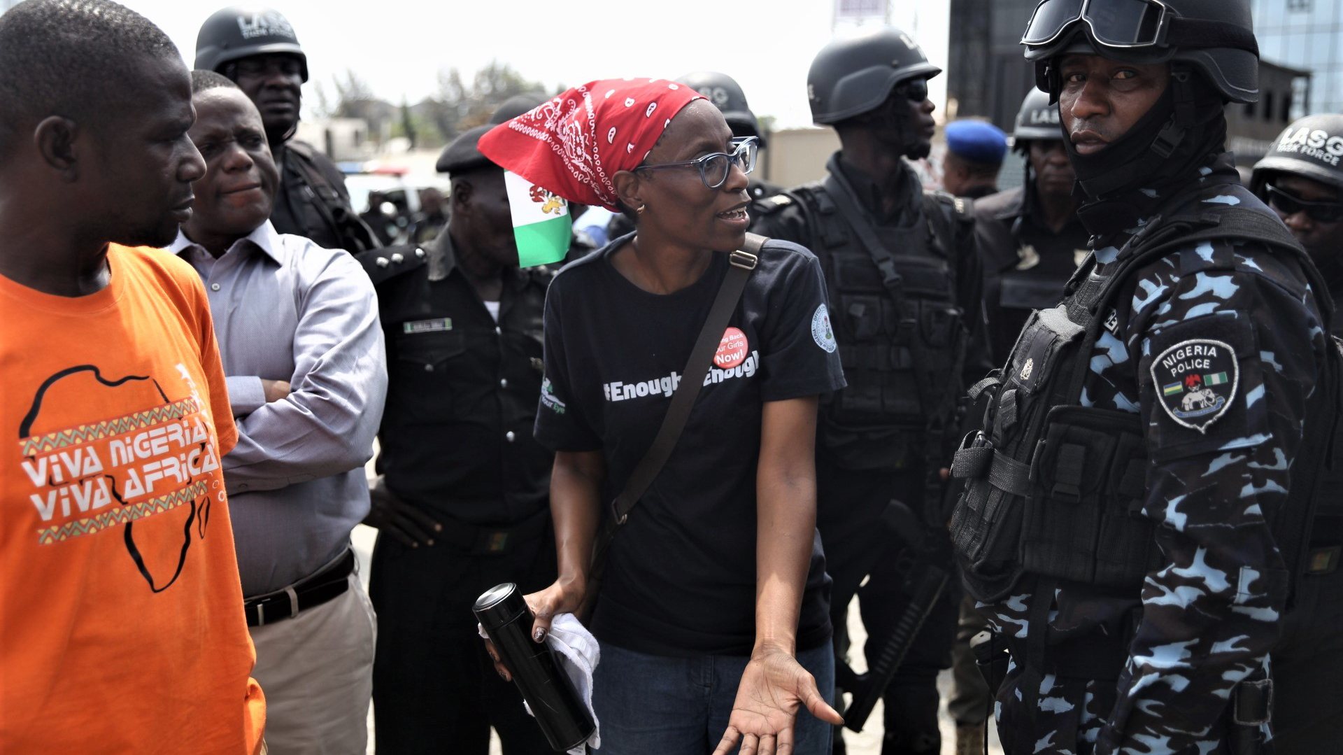 epa10254574 A Protester confronts the police as she attends a rally marking the second anniversary of the End-Sars protest in Lagos, Nigeria, 20 October 2022. Organizers of the 2020 End-Sars protest held a memorial in the Lekki area of Lagos to commemorate the death of citizens, particularly youths, who were allegedly massacred by the Nigerian army, at the Lekki Tollgate on 20 October 2020.  EPA/AKINTUNDE AKINLEYE