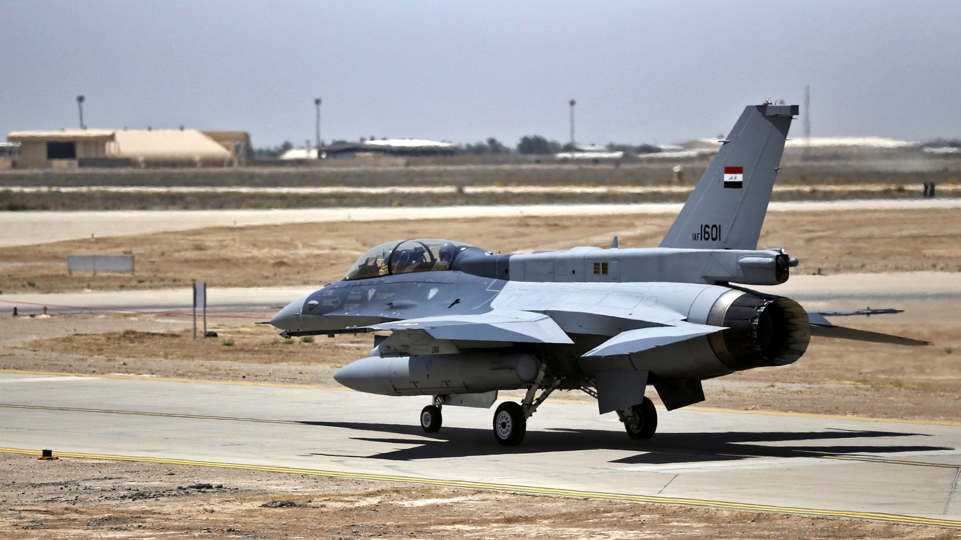 epa08123040 (FILE) - One of four F-16 fighter jets sits on a runway during the delivery ceremony in Balad Air Base in Salahuddin province, northern Iraq, 20 July 2015 (reissued 12 January 2020). According to reports, four soldiers were injured on 12 January 2020 after rockets hit the Iraqi airbase. The base is reported to also host US troops.  EPA/ALI ABBAS  EPA-EFE/ALI ABBAS *** Local Caption *** 52063486