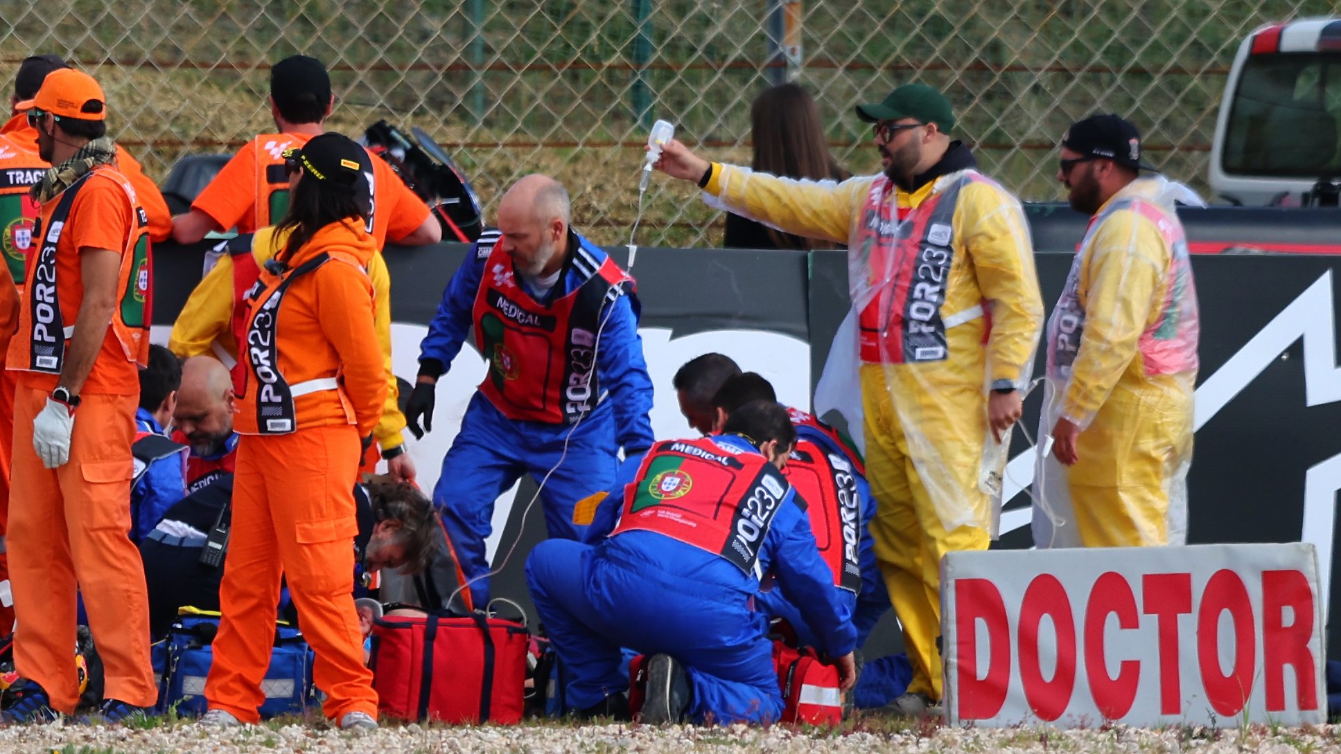 Spanish MotoGP rider Pol Espargaro of GASGAS Factory Racing Tech3 is assisted by a medical team after a fall during the second practice session for the the Motorcycling Grand Prix of Portugal at Algarve International race track, Portimao, south of Portugal, 24 March 2023. The Motorcycling Grand Prix of Portugal will take place on 26 March 2023. NUNO VEIGA/LUSA