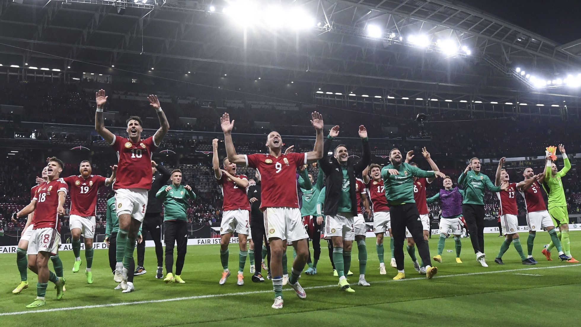 epa10202558 Players of Hungary celebrate after winning the UEFA Nations League soccer match between Germany and Hungary in Leipzig, Germany, 23 September 2022.  EPA/Tibor Illyes HUNGARY OUT