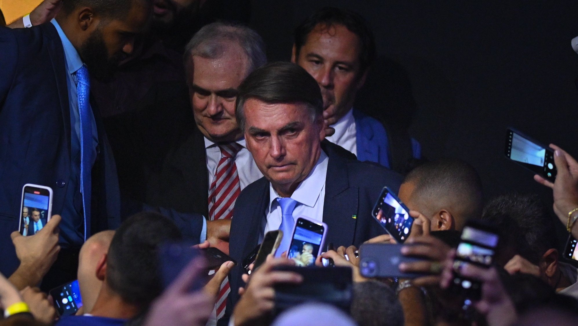 epa11247633 The former president of Brazil, Jair Bolsonaro (2019-2022), speaks to the press during the incorporation ceremony of Senator Izalci Lucas to the Liberal Party (PL) in Brasilia, Brazil, 27 March 2024.  EPA/Andre Borges