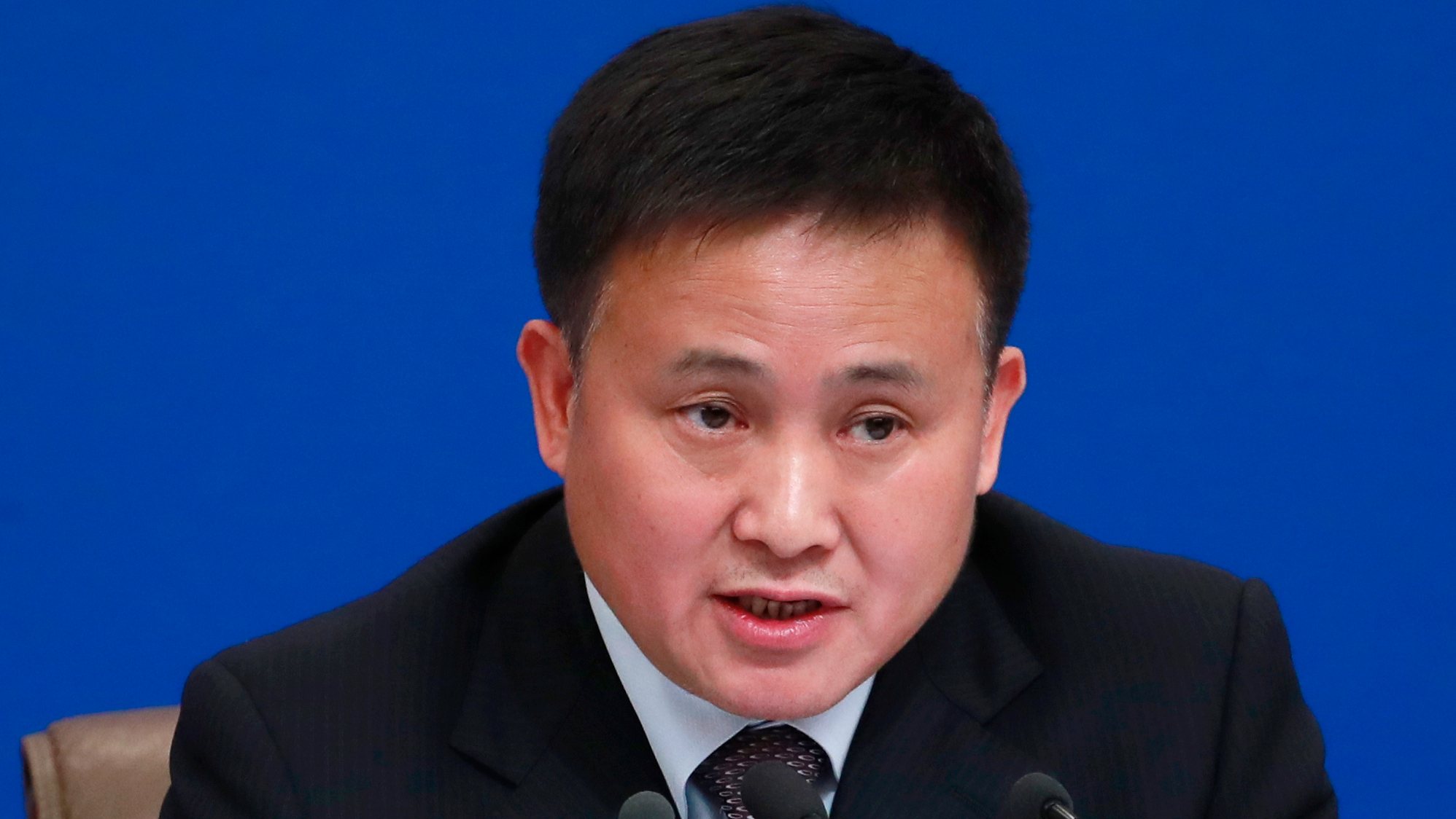 epa07426365 Pan Gongsheng, Deputy governor of People&#039;s Bank of China (PBOC) and Director of the state administration of foreign exchange, speaks to reporters during a press conference on the sideline of the second session of the 13th National People&#039;s Congress (NPC) in Beijing, China, 10 March 2019.  EPA/HOW HWEE YOUNG