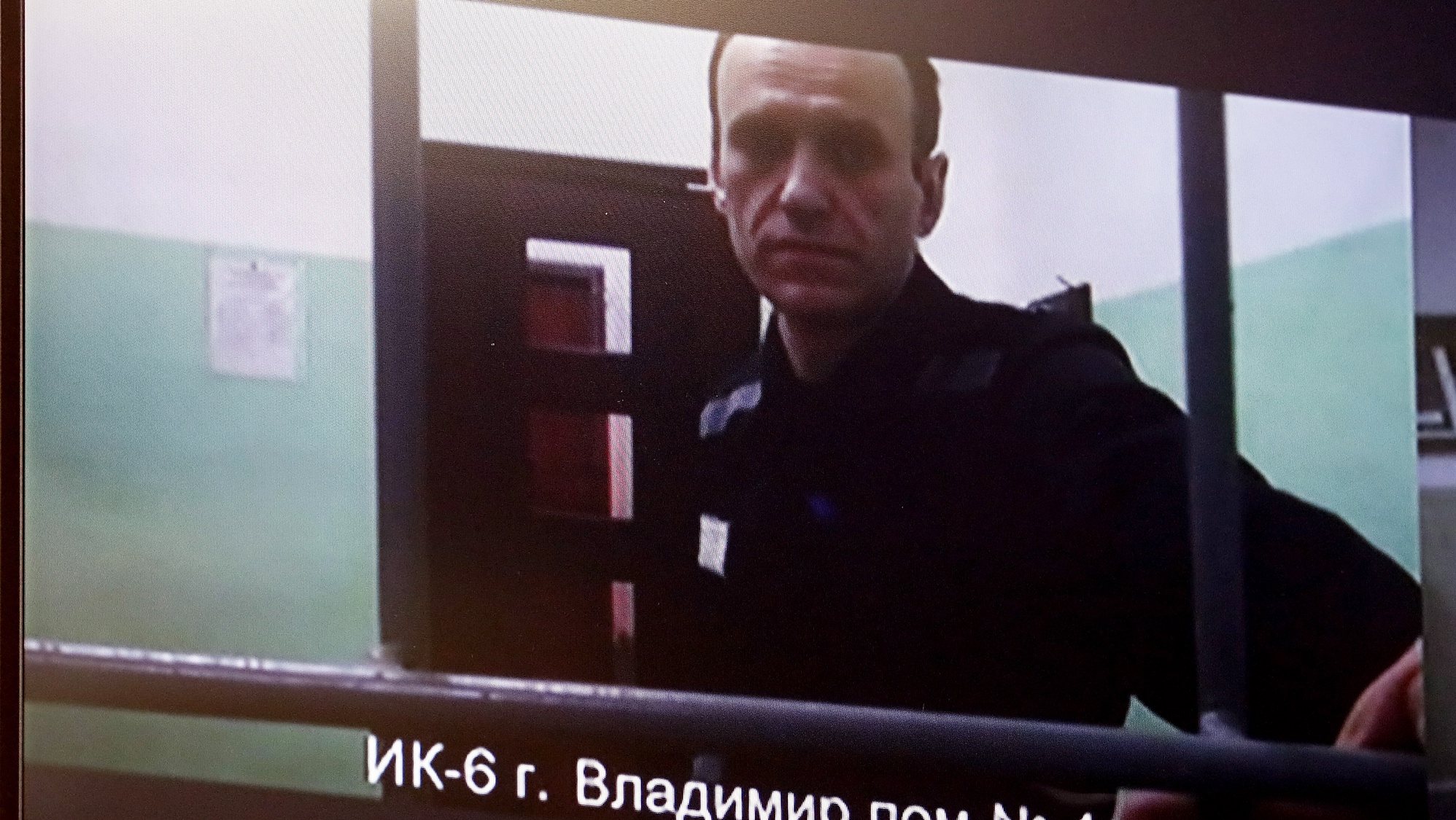 epa10884391 Russian opposition figure Alexei Navalny is seen on a screen as he appears in a video link from the colony in Vladimir region, during a hearing of The First Court of Appeal of General Jurisdiction considering his appeal against the sentence of 19 years in prison in a case of extremism, Moscow, Russia, 26 September 2023. Navalny has been in the colony since February 2021, when the court, at the request of the Federal Penitentiary Service, replaced his suspended sentence in the Yves Rocher case of 2014 with a real one. He was supposed to serve in a penal colony for 2 years and 8 months, but in March 2022, the Lefortovo Court of Moscow, at an off-site meeting in correctional colony in the city of Pokrov, Vladimir Region, sentenced the politician to 9 years of strict regime and a fine of 1.2 million rub., as well as one and a half years of restriction of freedom in the case of fraud and contempt of court. In June 2023 Navalny went on trial on new charges of extremism. The court sentenced politician Alexei Navalny to 19 years in a strict regime colony. The First Court of Appeal of General Jurisdiction rejected the politician&#039;s complaint.  EPA/MAXIM SHIPENKOV