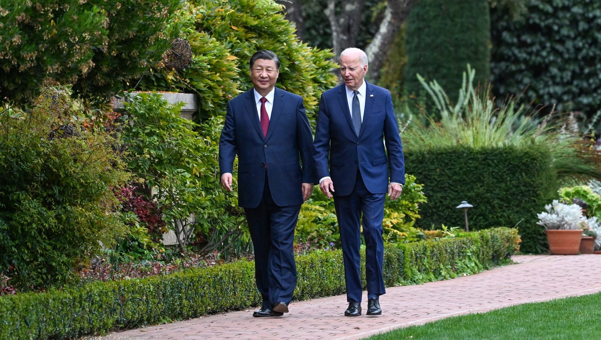 epa10977854 US President Joe Biden (R) and Chinese President Xi Jinping take a walk after their talks in the Filoli Estate in Woodside, south of San Francisco, California, USA, 15 November 2023 (issued 16 November 2023). Chinese President Xi and US President Biden on 15 November, had an in-depth exchange of views on strategic and overarching issues critical to the direction of China-US relations and on major issues affecting world peace and development.  EPA/XINHUA / RAO AIMIN CHINA OUT / UK AND IRELAND OUT  /       MANDATORY CREDIT  EDITORIAL USE ONLY  EDITORIAL USE ONLY