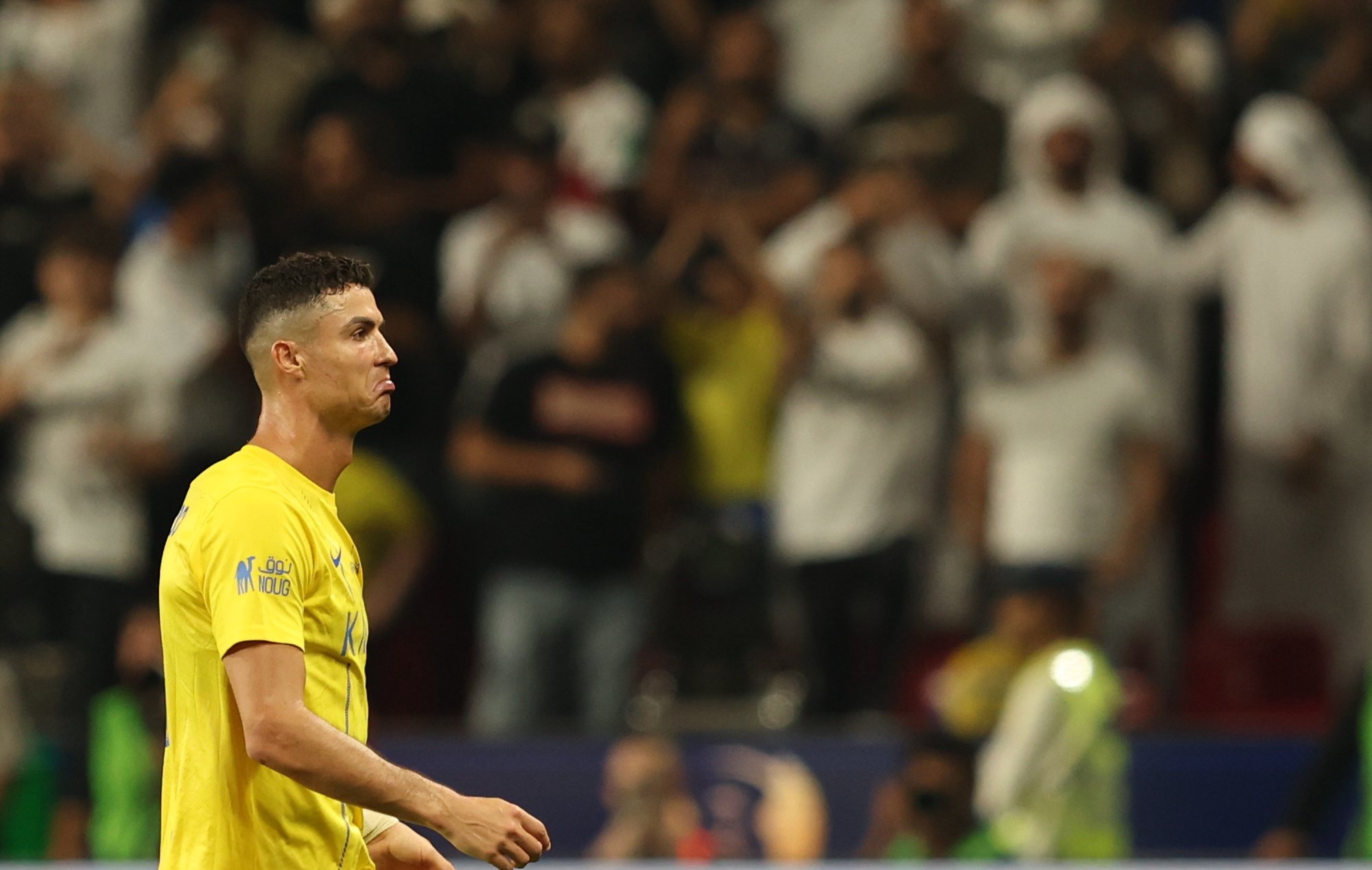 epa11266544 Cristiano Ronaldo of Al-Nassr reacts after getting a red card during the semifinal soccer match of the Saudi Super Cup between Al-Hilal and Al-Nassr in Abu Dhabi, United Arab Emirates, 08 April 2024.  EPA/ALI HAIDER