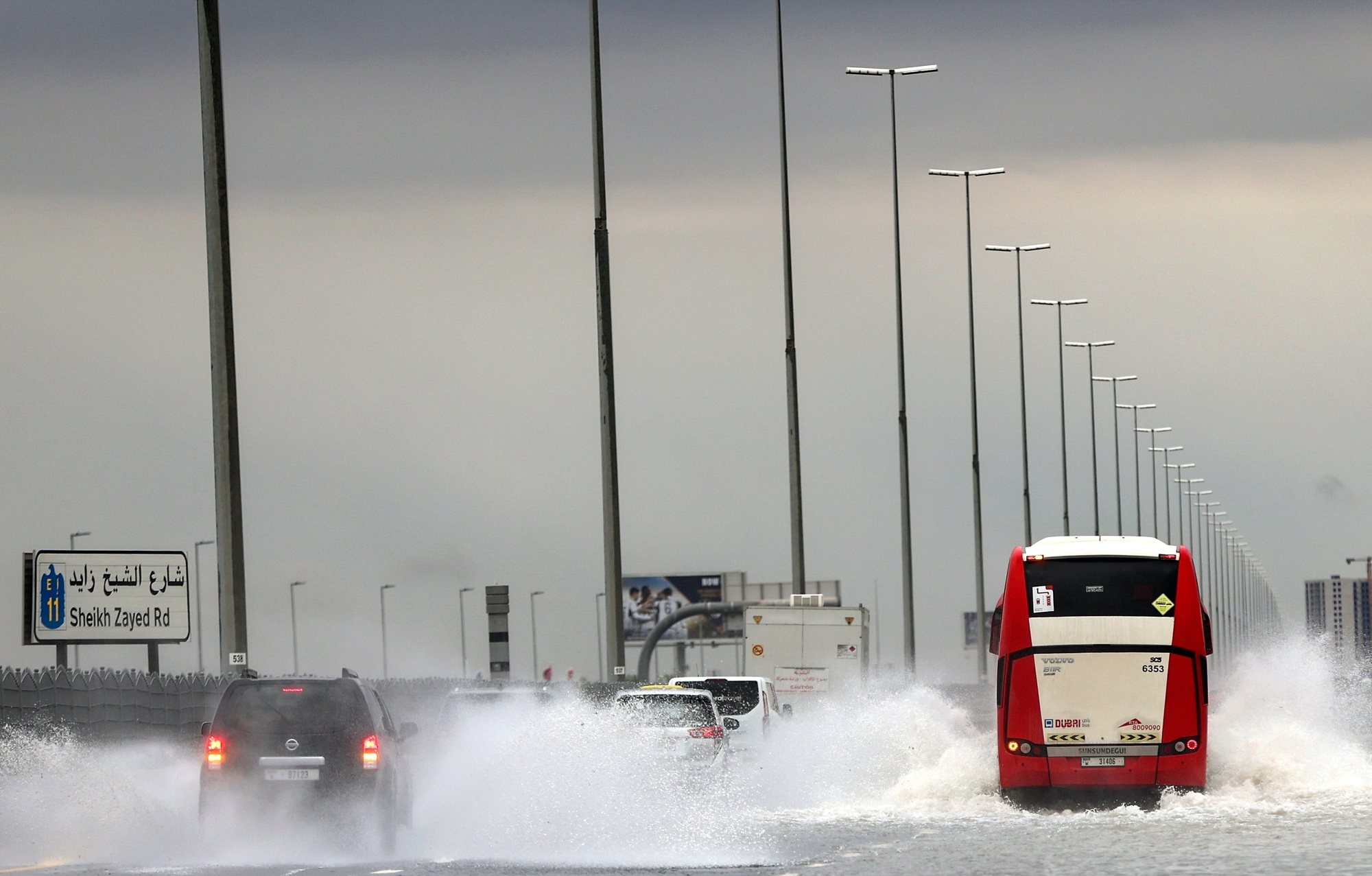 epa11282507 Motorists drive during a heavy rainfall in the road between Abu Dhabi and Dubai, United Arab Emirates, 16 April 2024. A severe wave of thunderstorms with heavy rainfall is hitting most UAE&#039;s cities especially in Dubai, Sharjah and Al Ain where the Asian Champions League semi final first leg match between UAE&#039;s Al-Ain Club and Al-Hilal from Saudi Arabia has been postponed.  EPA/ALI HAIDER