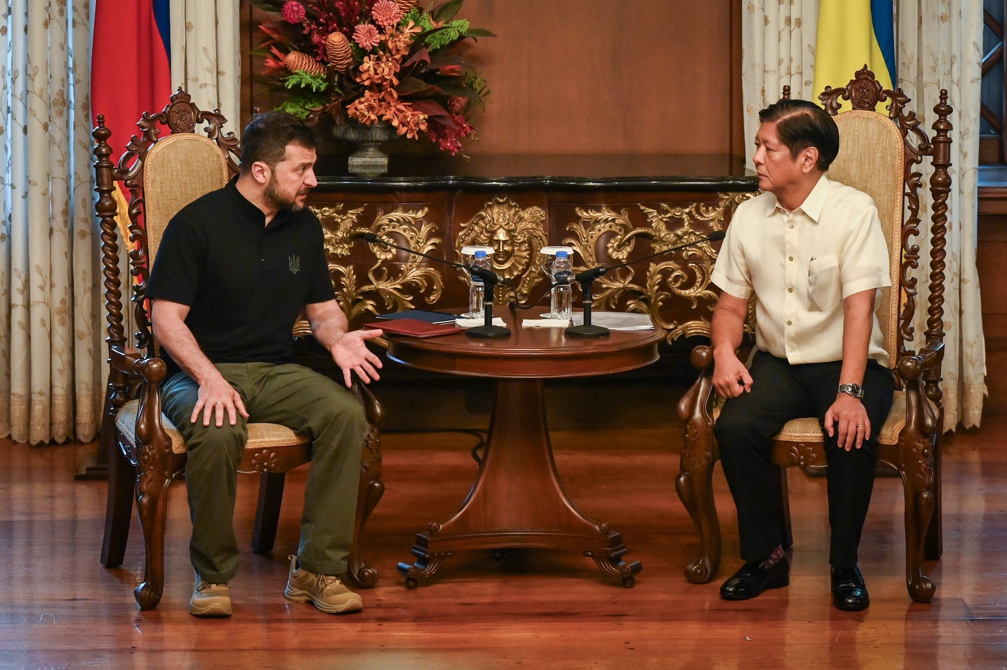 epa11386580 Ukraine President Volodymyr Zelensky (L) speaks as Philippine President Ferdinand ‘Bongbong’ Marcos Jr. (R) listens during a bilateral meeting inside Malakanang presidential palace in Manila, Philippines, 03 June 2024. Zelensky is on his first visit to Manila since being elected and will meet with President Marcos to discuss security issues.  EPA/JAM STA ROSA / POOL