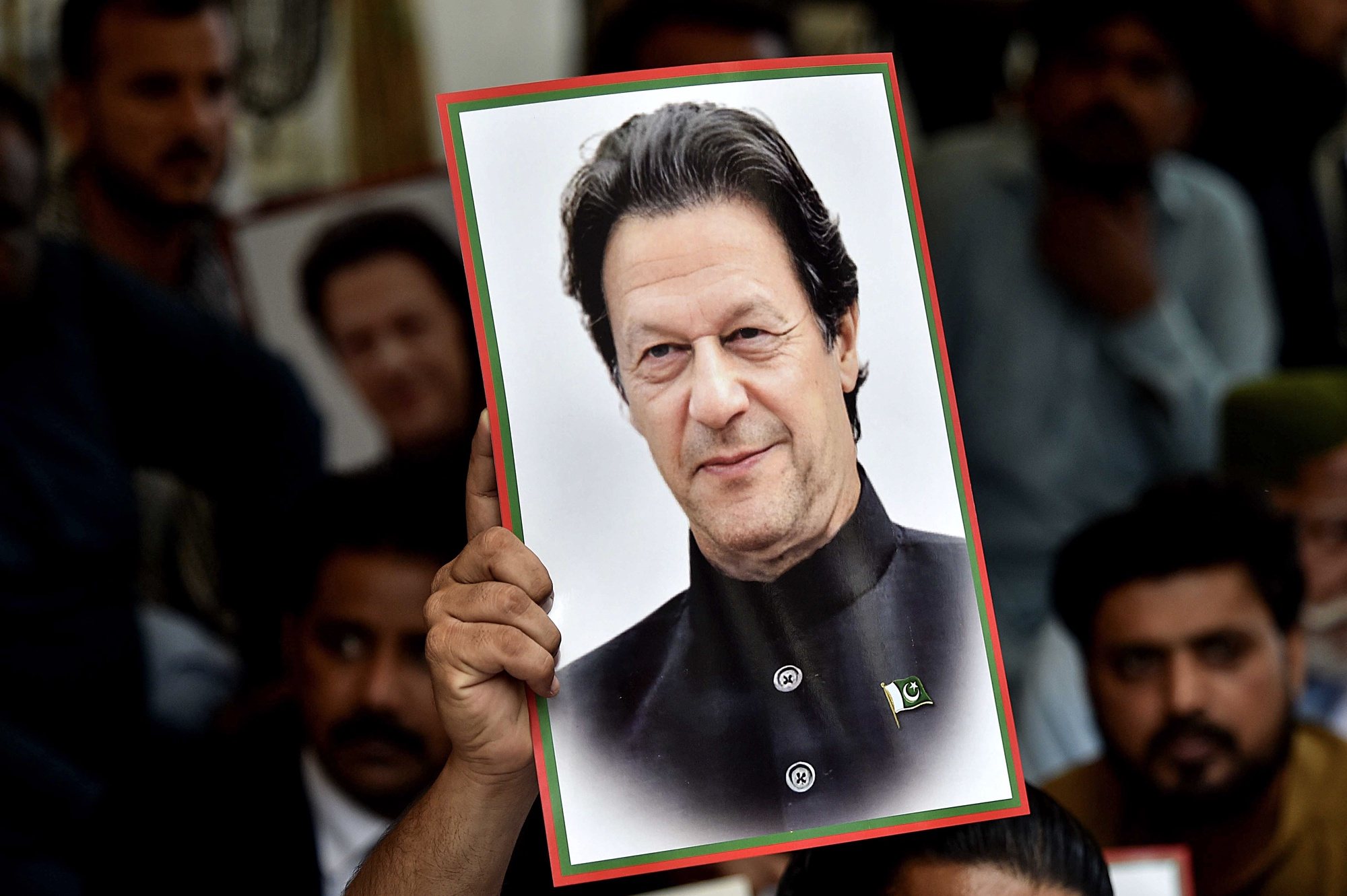 epa11377214 Supporters of Pakistan Tehreek-e-Insaf (PTI) party display portraits of the party&#039;s founder and convicted former Prime Minister Imran Khan as they attend a protest demanding his release, in Karachi, Pakistan, 29 May 2024. Representatives from multiple wings of the Pakistan Tehreek-e-Insaf (PTI) party staged the rally demanding Khan&#039;s release.  EPA/SHAHZAIB AKBER
