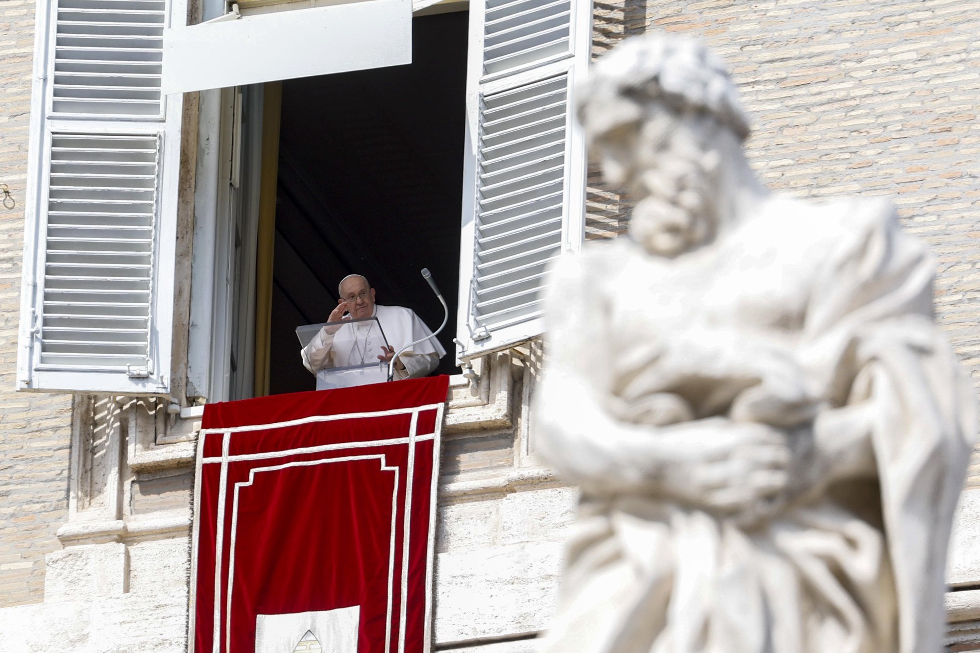 epa11225398 Pope Francis leads his Angelus prayer from the window of his office overlooking St. Peter&#039;s Square at the Vatican City, 17 March 2024.  EPA/FABIO FRUSTACI