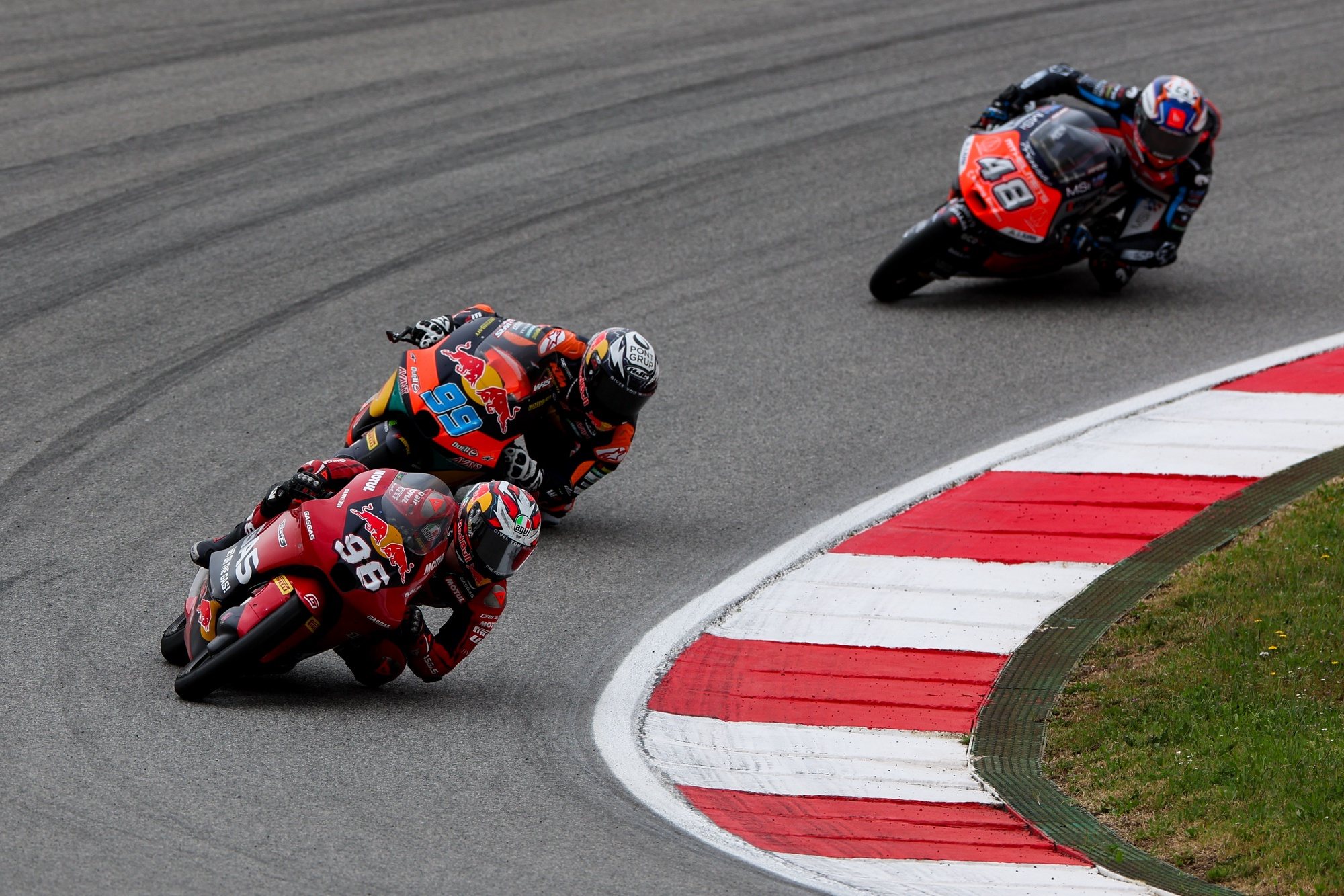 (L-R) Daniel Holgado of Spain and Red Bull GASGAS Tech3, Jose Antonio Rueda of Spain and Red Bull KTM Ajo and Ivan Ortola of Spain and MT Helmets MSI in action during the Moto3 Motorcycling Grand Prix of Portugal, in Portimao, Portugal, 24 March 2024. JOSE SENA GOULAO/LUSA