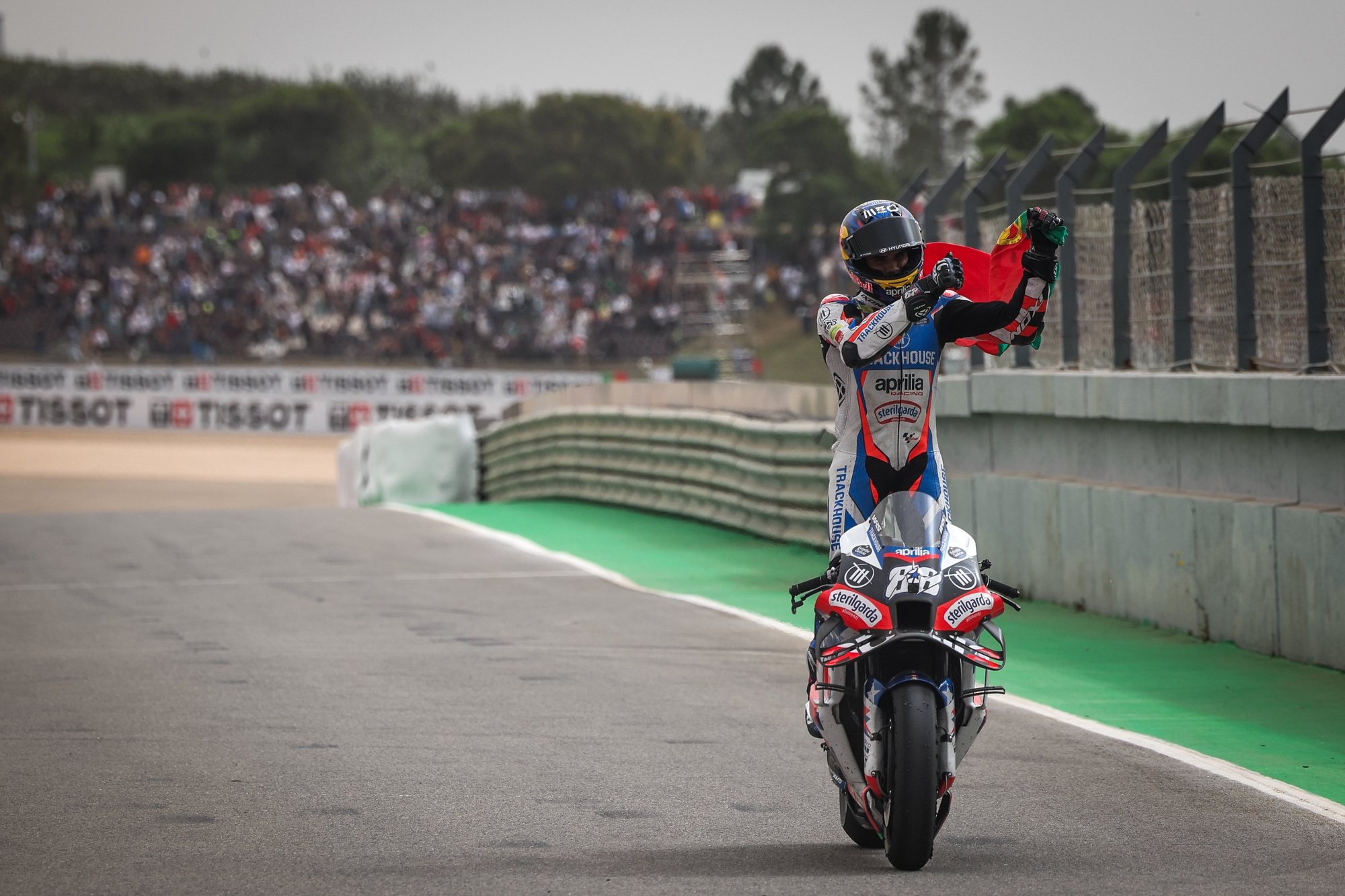 Miguel Oliveira of Portugal and Trackhouse Racing acknowledges the home crowd at the end of the Moto GP Motorcycling Grand Prix of Portugal, in Portimao, Portugal, 24 March 2024. JOSE SENA GOULAO/LUSA