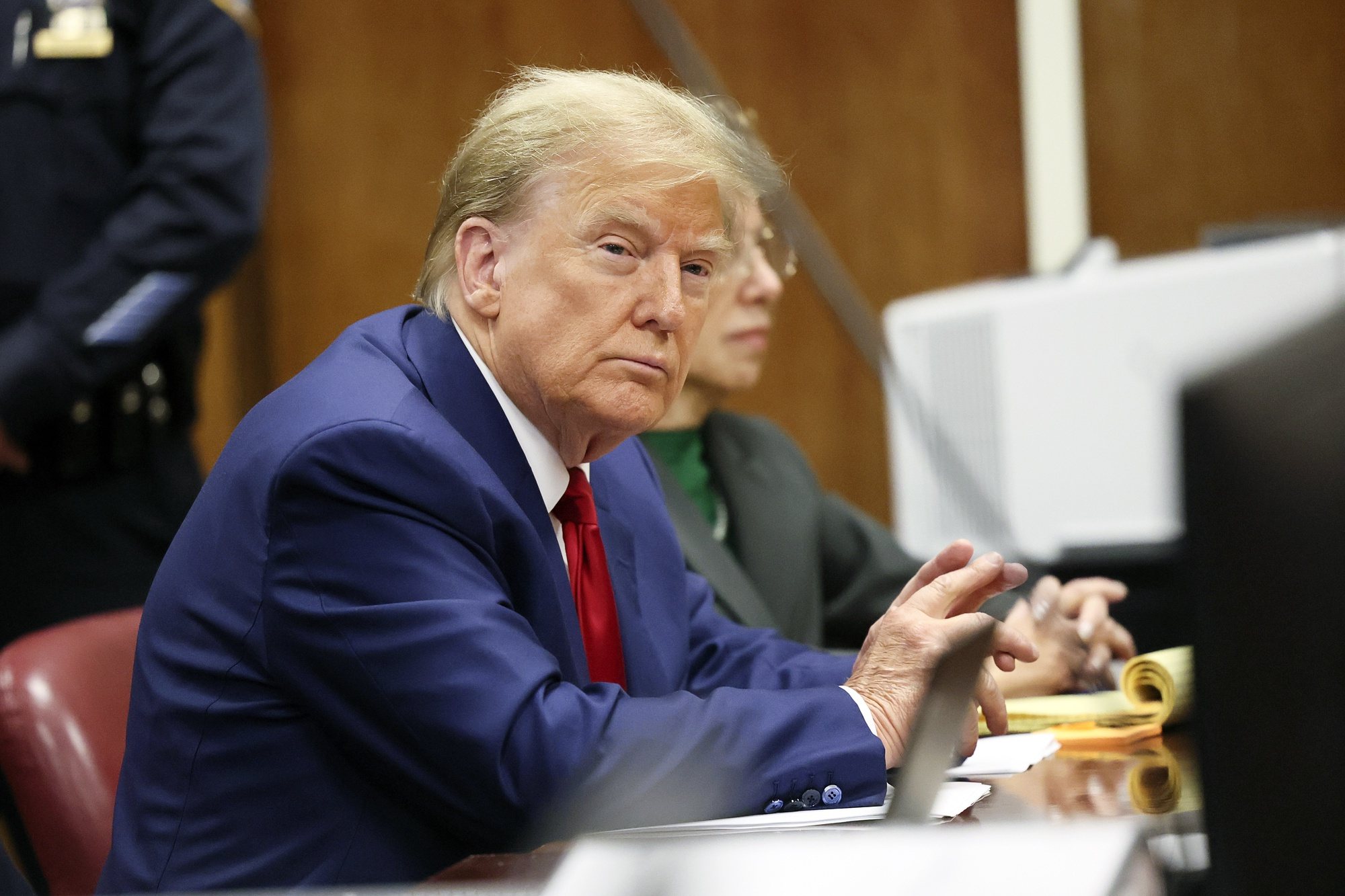 epa11242754 Former U.S. President Donald Trump sits in the courtroom at a hearing in his criminal case on charges stemming from hush money paid to a porn star in New York City, New York, USA, 25 March 2024. Trump is facing 34 felony counts of falsifying business records related to payments made to adult film star Stormy Daniels during his 2016 presidential campaign.  EPA/BRENDAN MCDERMID / POOL