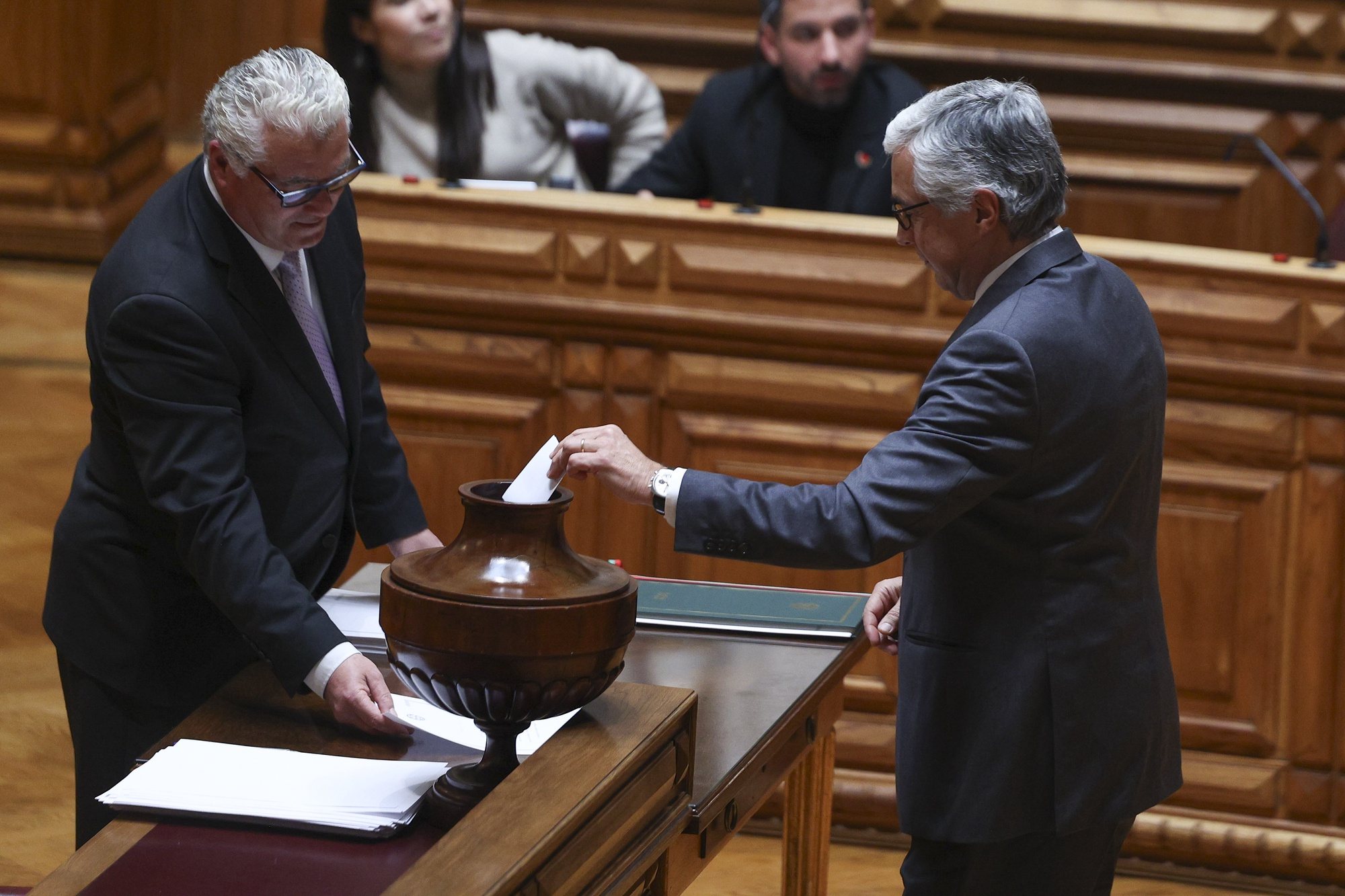 The deputy of the Social Democratic Party (PSD), Jose Pedro Aguiar Branco (R), votes in the election for the President of the Portuguese Parliament, who will succeed Augusto Santos Silva, Lisbon, Portugal, 26th March 2024.TIAGO PETINGA/LUSA