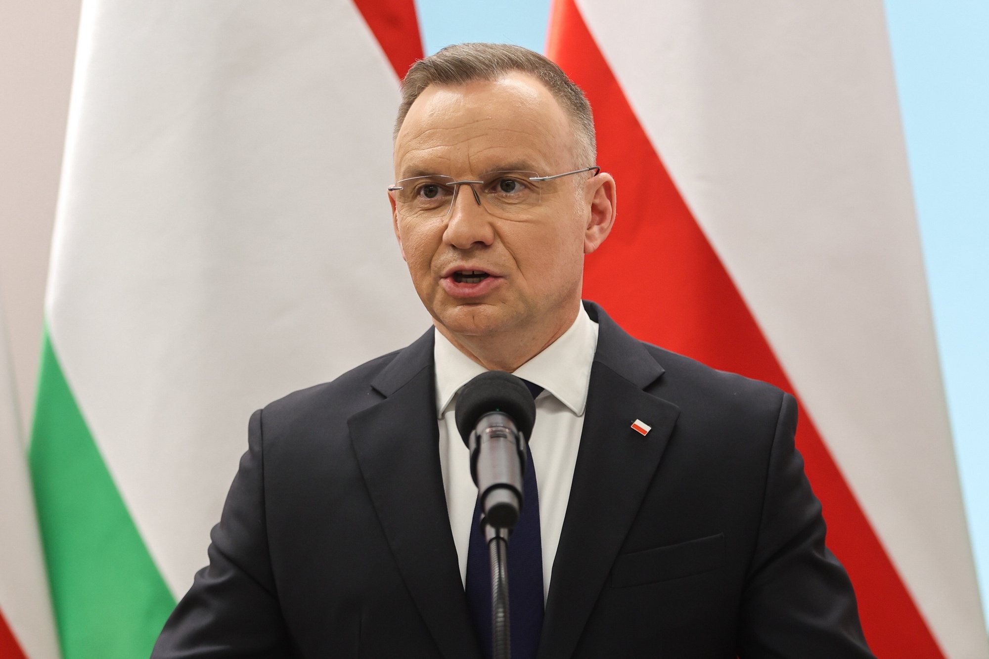 epa11236888 Polish President Andrzej Duda and Hungarian President Tamas Sulyok (not pictured) attend a press conference after their meeting at the Culture and Art Centre in Stary Sacz, southern Poland, 22 March 2024. Hungarian President Tamas Sulyok and his wife are paying a working visit to Poland on the occasion of Polish-Hungarian Friendship Day.  EPA/Leszek Szymanski POLAND OUT