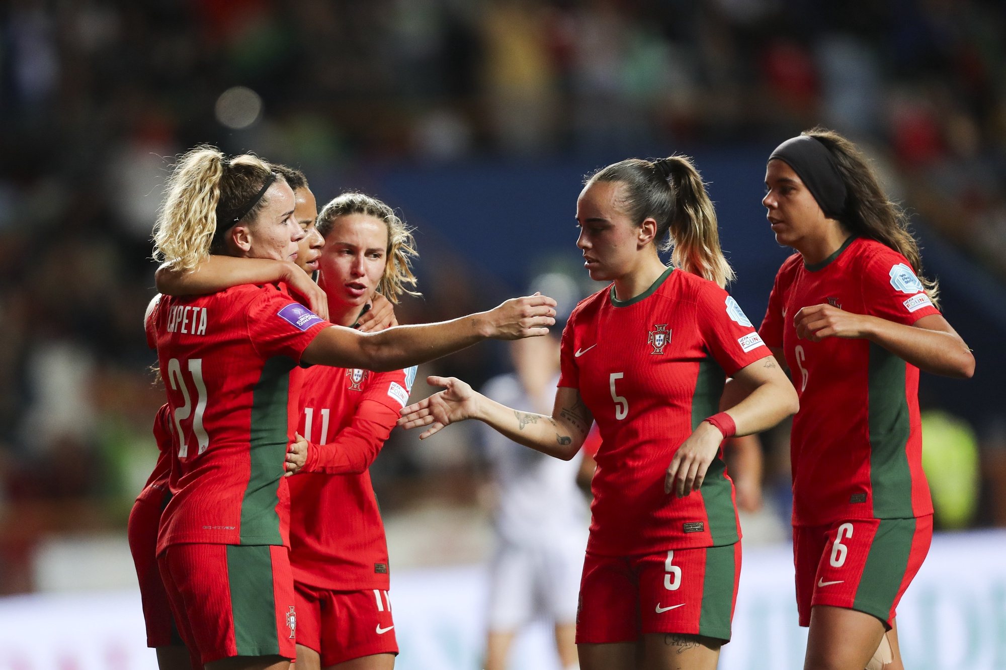 Portugal players celebrate after scoring a goal against Bosnia and Herzegovina during their European Women’s Championship soccer match held at Magalhaes Pessoa Stadium, in Leiria, Portugal, 5 April 2024. PAULO CUNHA/LUSA