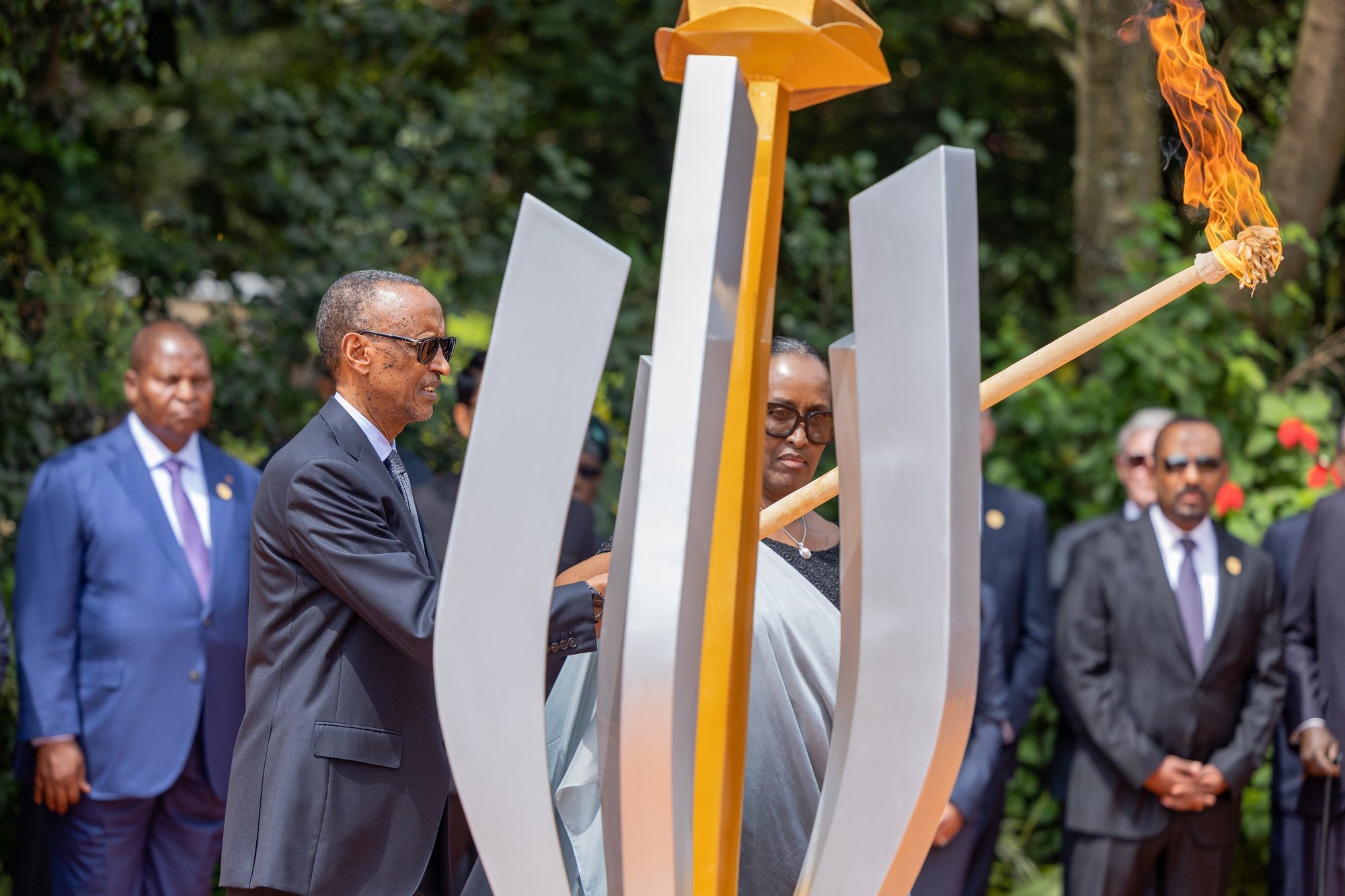 epa11263825 The President of Rwanda Paul Kagame (L) and first lady Jeannette Kagame (R) light up a flame during the commemoration ceremony of the 30th anniversary of the Tutsi genocide, also known as Kwibuka 30, in Kigali, Rwanda, 07 April 2024. Starting in 07 April 1994 and lasting until 15 July 1994 during the Rwandan Civil War, 800,000 people were killed by ethnic Hutu extremists targeting members of the minority Tutsi community.  EPA/MOISE NIYONZIMA