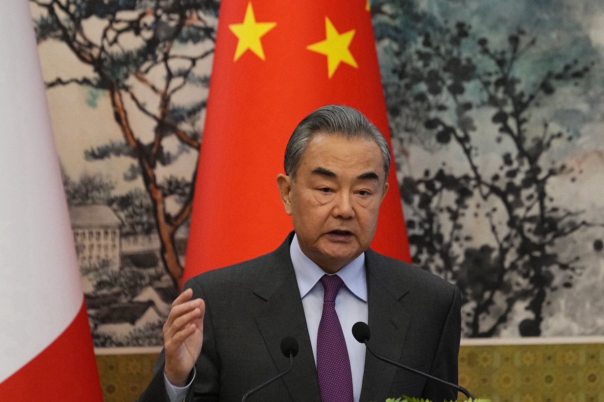 epa11254143 Chinese Foreign Minister Wang Yi speaks during a joint press conference with French Foreign Minister Stephane Sejourne (not pictured) at the Diaoyutai State Guesthouse in Beijing, China, 01 April 2024.  EPA/KEN ISHII/ POOL