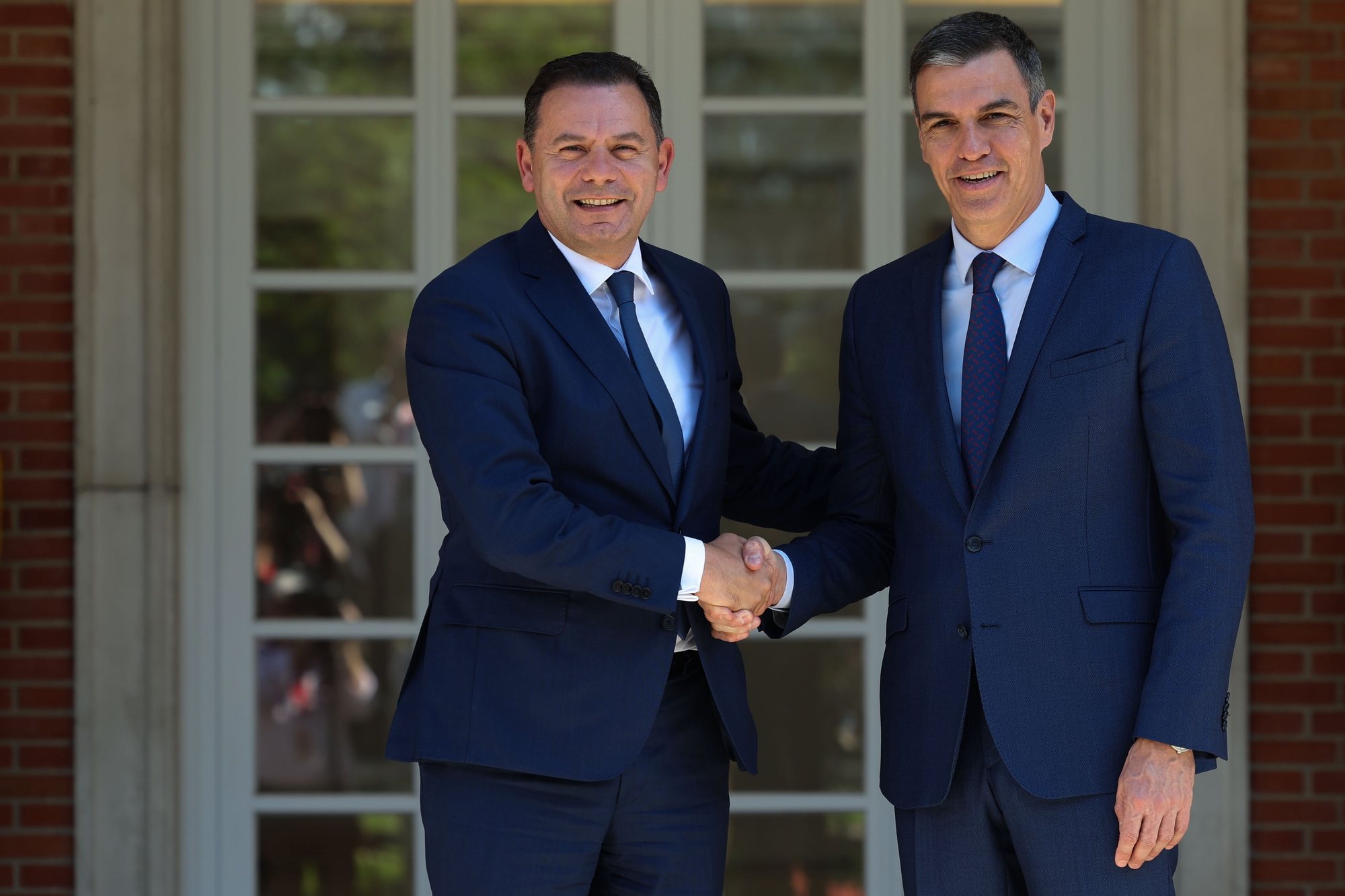 epa11280415 Spanish Prime Minister Pedro Sanchez (R) welcomes Portuguese Prime Minister Luis Montenegro (L) at the Moncloa Palace in Madrid, Spain, 15 April 2024. Montenegro is on an official visit to Spain.  EPA/KIKO HUESCA