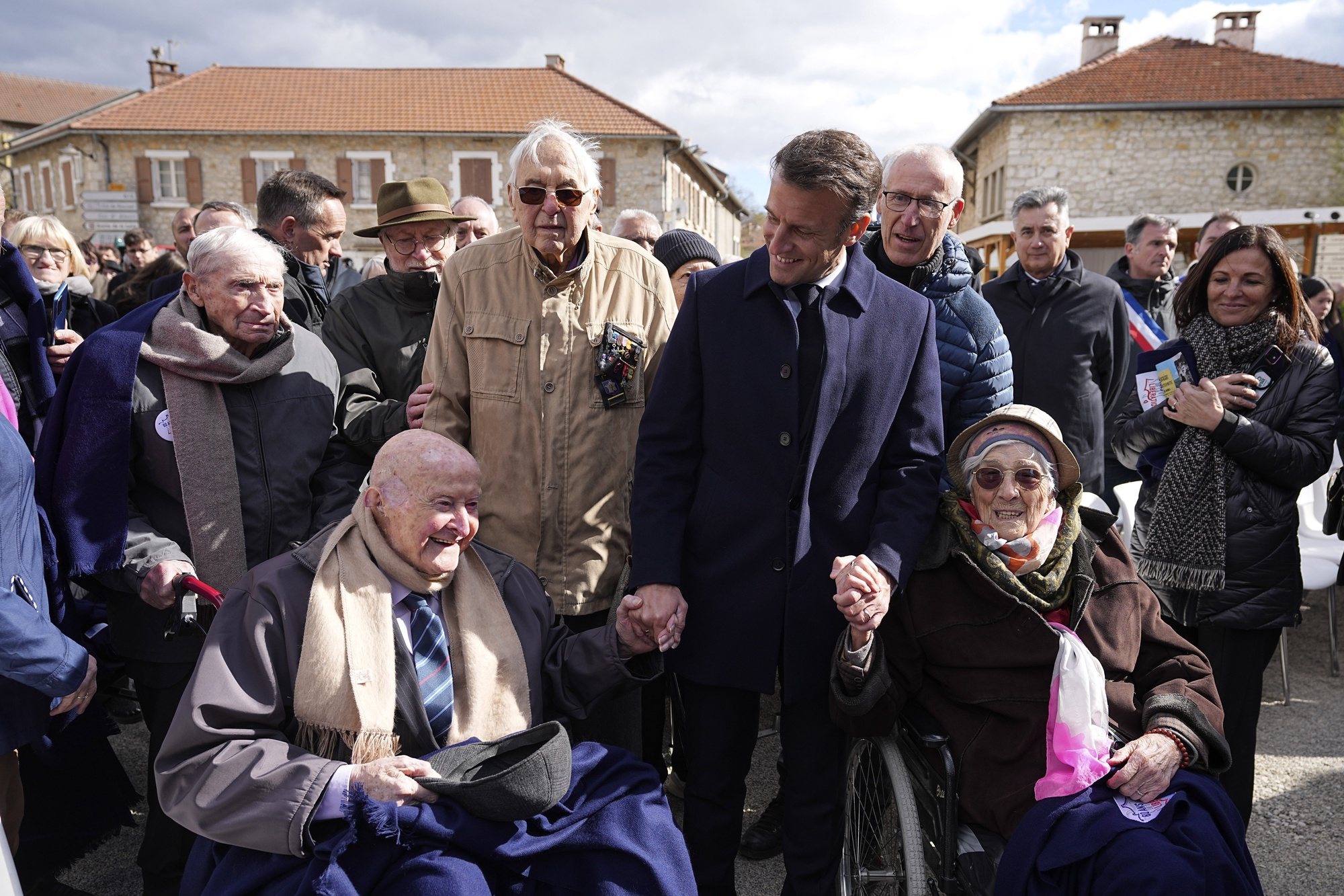 epa11282327 French President Emmanuel Macron meets Alphonse Taravello (L), 98, a resistance fighter, and Yvonne Cheval , 99, who lost part of her family during WWII, in Vassieux-en-Vercors, central France, 16 April 2024. The French president is in the region to pay homage to the local Resistance during WWII as part of the 80th anniversary of the liberation of Nazi occupied France.  EPA/Laurent Cipriani / POOL  MAXPPP OUT