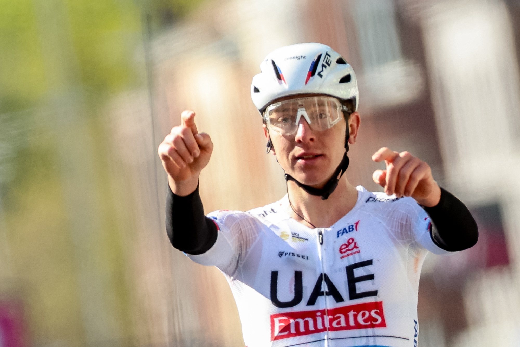 epa11291880 Slovenian rider Tadej Pogacar of UAE Team Emirates celebrates winning the Liege-Bastogne-Liege cycling race over 254.5 km, in Liege, Belgium, 21 April 2024.  EPA/Olivier Hoslet