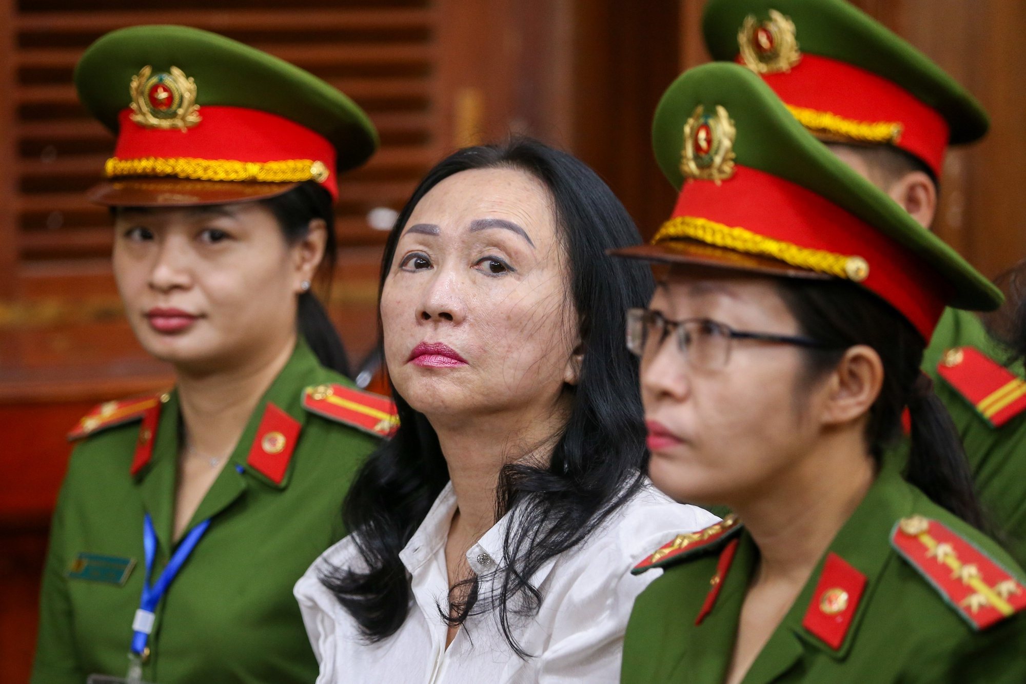 epa11271679 Truong My Lan (C), chairwoman of Van Thinh Phat Holdings, sits during her trial at the Ho Chi Minh City People&#039;s Court in Ho Chi Minh City, Vietnam, 11 April 2024. Vietnamese tycoon Truong My Lan awaits her verdict, potentially facing the death penalty for one of the country&#039;s largest fraud cases, which involves the embezzlement of USD 12.5 billion from Saigon Commercial Bank. She, along with 85 others, is awaiting verdicts and sentencing in Ho Chi Minh City on charges that include bribery, abuse of power, appropriation, and violations of banking laws. Lan has denied the charges.  EPA/STRINGER