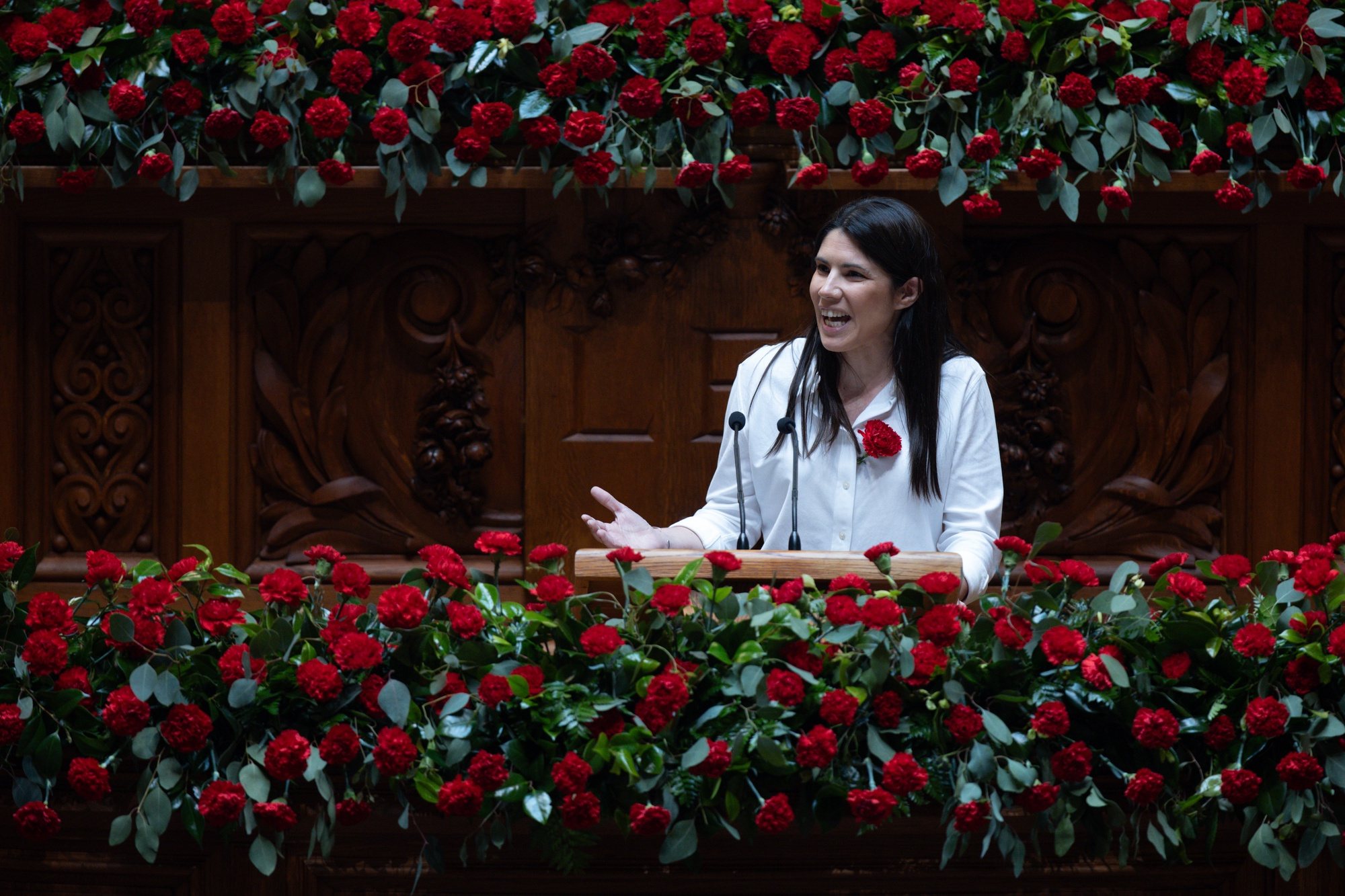 Portuguese leader of the Left Block (BE), Mariana Mortagua, delivers a speech during the solemn comemorative session at the Portuguese parliament in Lisbon, Portugal, 25 April 2024. Portugal celebrates the 50th anniversary of the Carnation Revolution that ended the authoritarian regime of Estado Novo (New State) that ruled the country between 1926 to 1974. JOSE SENA GOULAO/LUSA