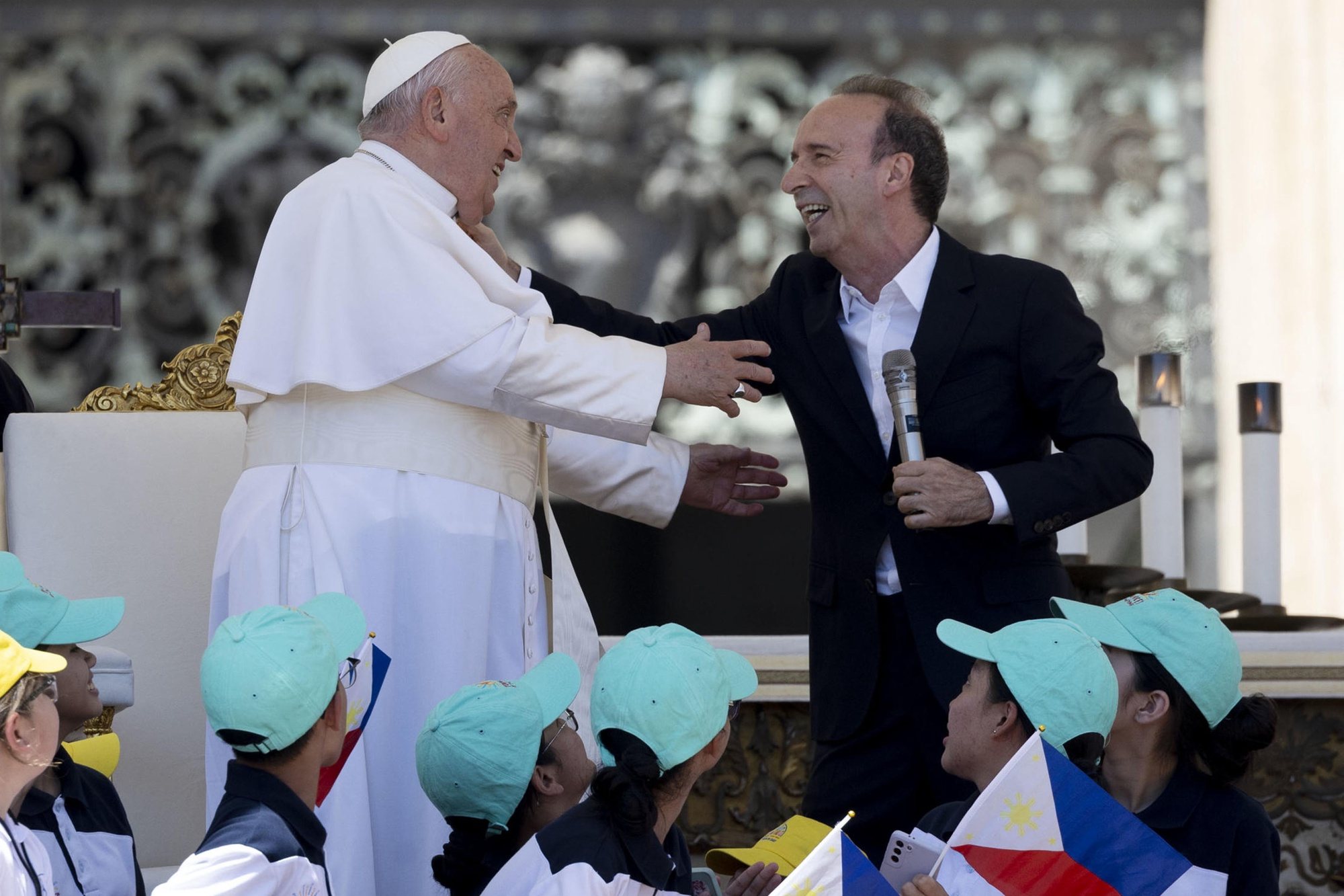 epa11370983 Pope Francis greets Italian film director Roberto Benigni during a mass on World Children&#039;s Day at Saint Peter&#039;s Basilica in the Vatican City, 26 May 2024. The World Children&#039;s Day celebration move to St. Peter&#039;s Square on 26 May, to be presided over by Pope Francis, and will culminate with the Angelus and the Pope&#039;s greeting to children from around the world.  EPA/MASSIMO PERCOSSI