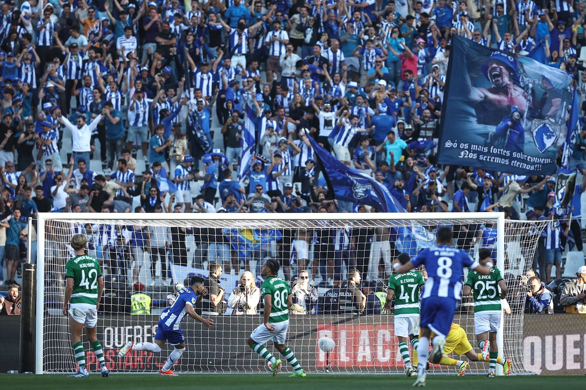 FC Porto Mehdi Taremi (2-L) celebrates after scoring the 2-1 lead goal during the Portuguese Soccer Cup final match between FC Porto and Sporting CP at Jamor Nacional stadium in Oeiras, outskirts Lisbon, Portugal, 26 May 2024. RODRIGO ANTUNES/LUSA
