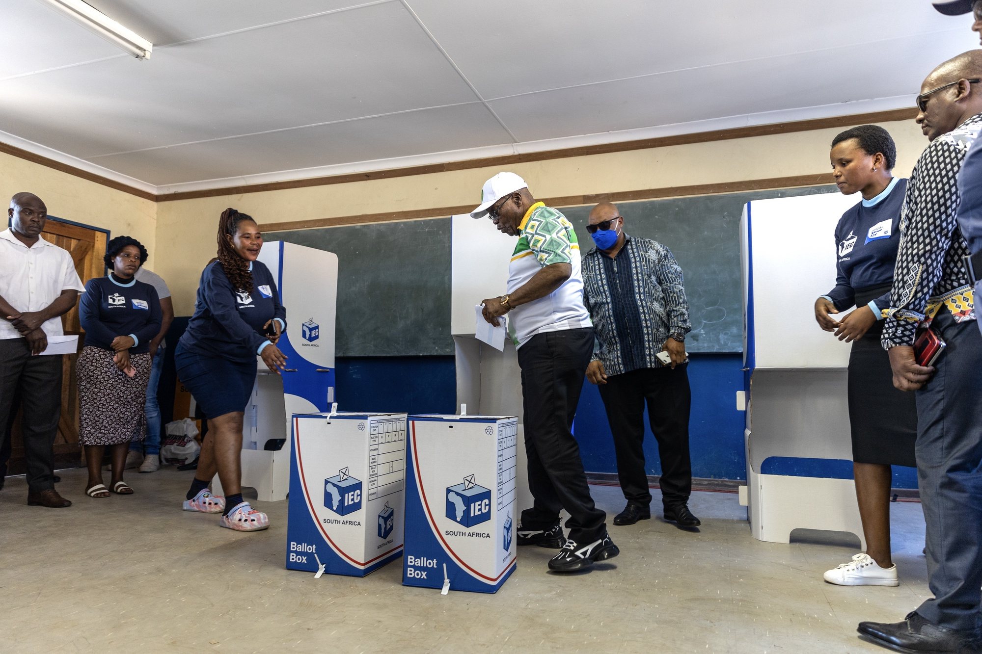 epa11377134 Former South African President Jacob Zuma (C) prepares to cast his vote during the South African general election in Nkandla, northern KwaZulu-Natal province, South Africa, 29 May 2024. Over 27 million citizens are registered to vote in the national and provincial elections to elect a new National Assembly and state legislatures, according to the Electoral Commission of South Africa. South Africans do not directly vote for the president. They vote for parties that will appoint 400 representatives to the National Assembly who will then choose the president for the next five years.  EPA/SANDILE NDLOVU