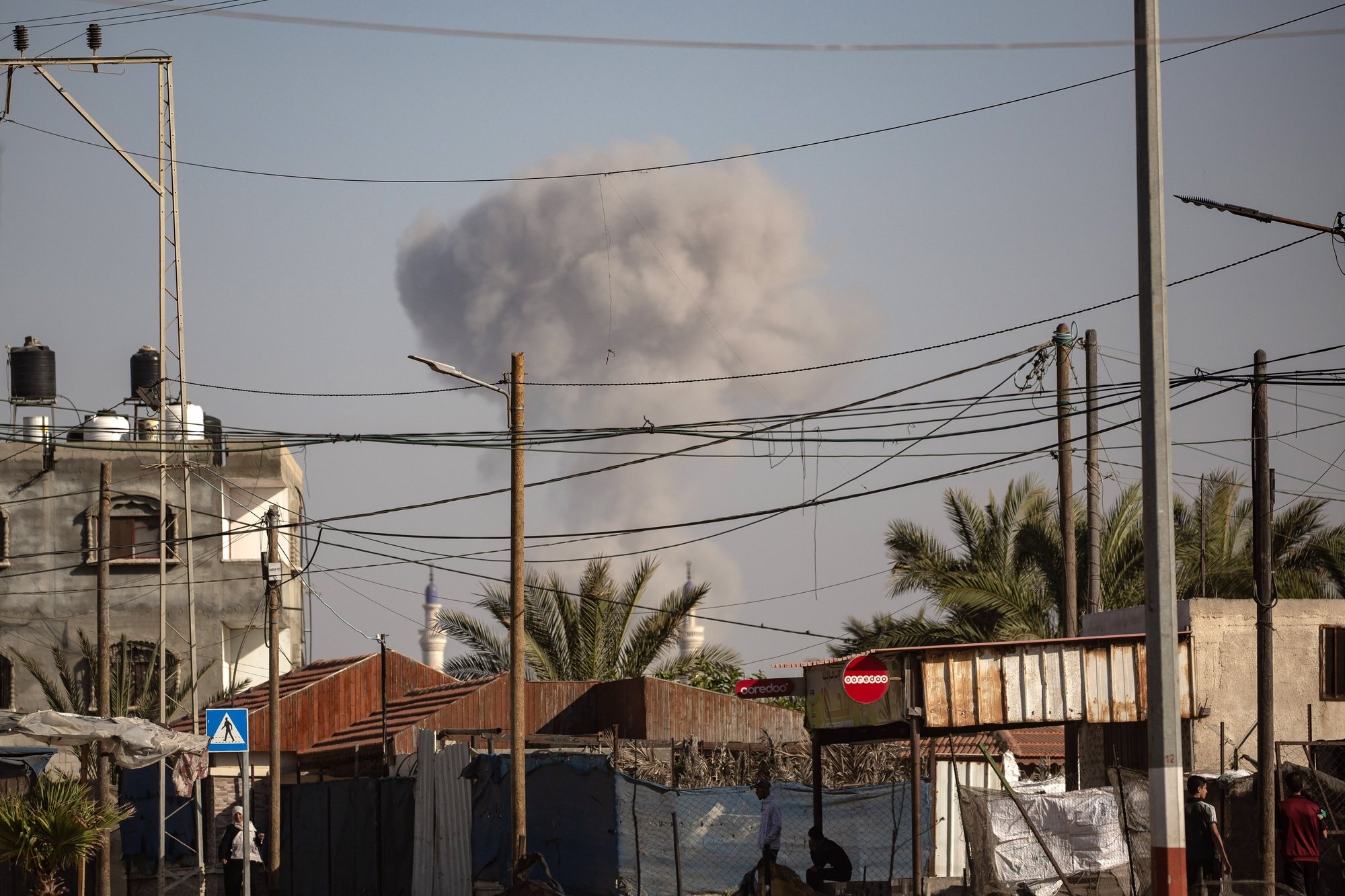 epaselect epa11385982 Smoke rises following an airstrike on Rafah, southern Gaza Strip, 02 June 2024. More than 36,000 Palestinians and over 1,400 Israelis have been killed, according to the Palestinian Health Ministry and the Israel Defense Forces (IDF), since Hamas militants launched an attack against Israel from the Gaza Strip on 07 October 2023, and the Israeli operations in Gaza and the West Bank which followed it.  EPA/HAITHAM IMAD