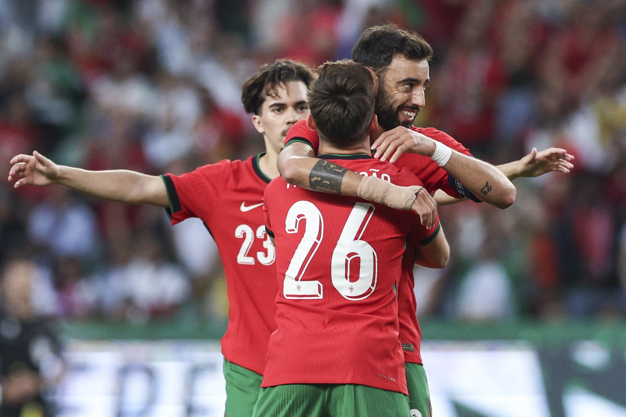 Portugal player Bruno Fernandes (R) celebrates a goal against Finland during their friendly match held at Alvalade Stadium, Lisbon, Portugal, 4th June 2024.    MIGUEL A. LOPES/LUSA