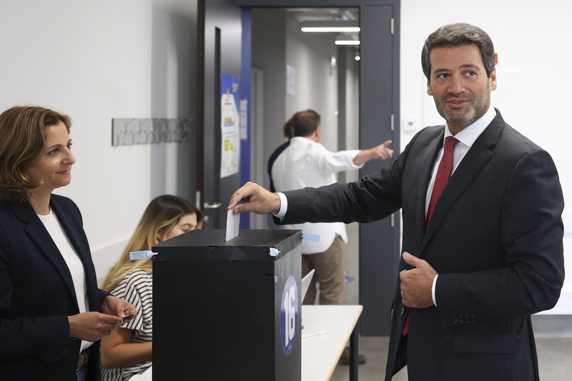 Chega (CH) President Andre Ventura (R) cast his ballot for the European Elections at a polling station in Lisbon, Portugal, 09 June 2024. More than 10.8 million registered voters in Portugal and abroad go to the polls today to choose 21 of the 720 members of the European Parliament. ANTONIO COTRIM/LUSA