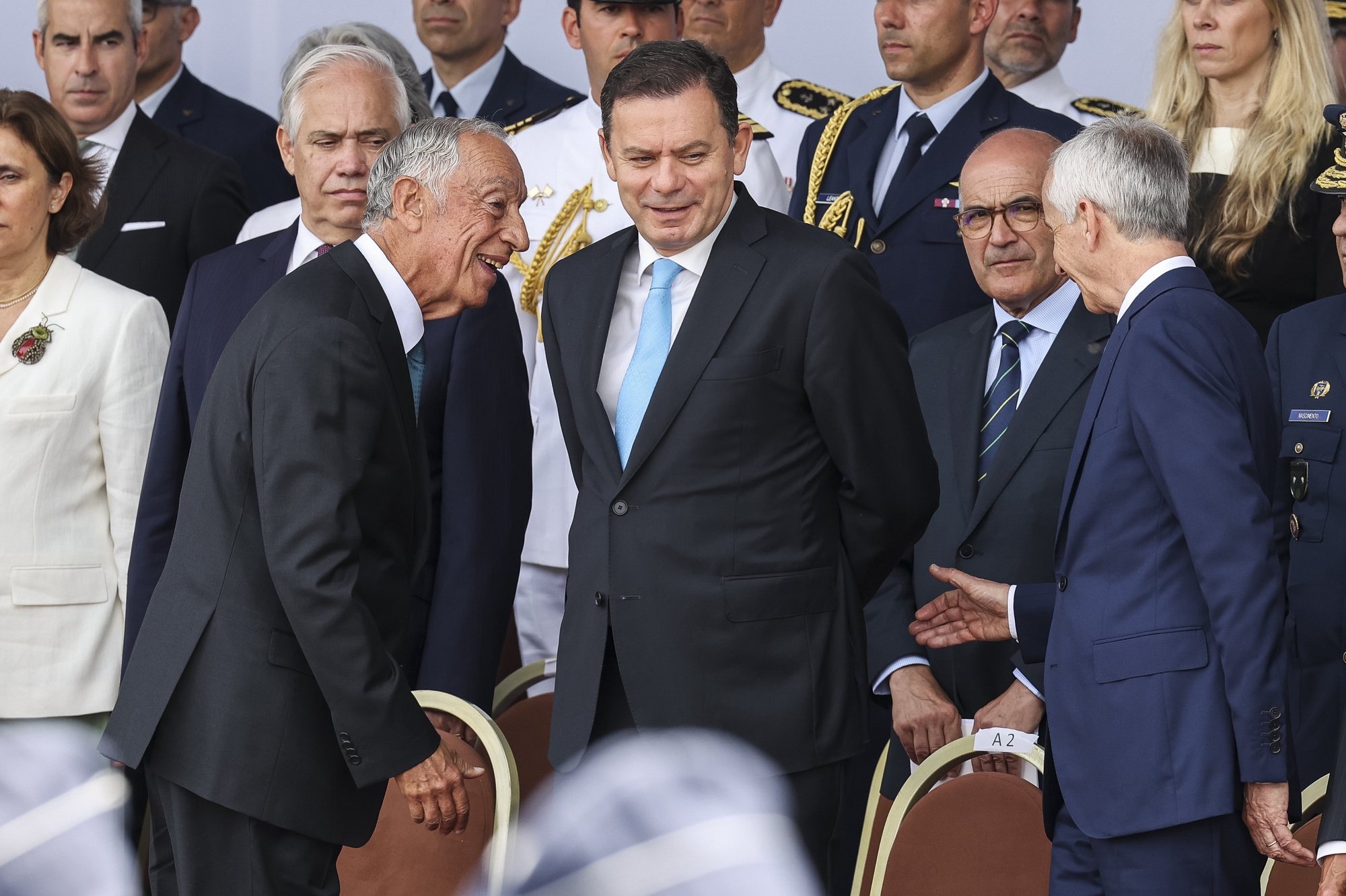 O Presidente da República, Marcelo Rebelo de Sousa (E) e o primeiro-ministro Luís Montenegro (C), durante a cerimónia militar comemorativa do Dia de Portugal, no âmbito das Comemorações do 10 de Junho, em Pedrógão Grande, 10 de junho de 2024. PAULO NOVAIS/LUSA