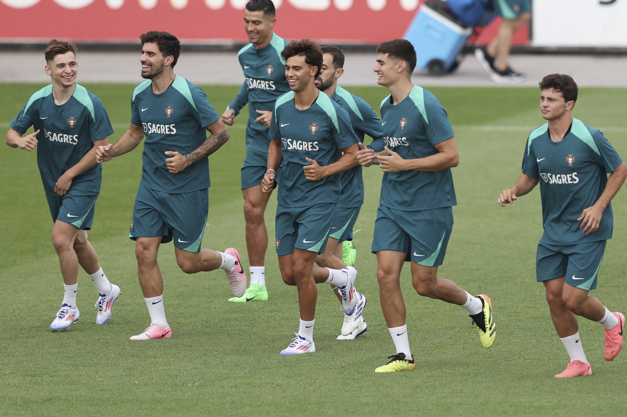 (L-R) Francisco Conceicao, Ruben Neves, Cristiano Ronaldo, Bernardo Silva, Joao Felix, Antonio Silva and Joao Neves of Portugal attend a training session, in Oeiras, Portugal, 10 June 2024. Portugal will play a friendly match against Ireland next 11 June in preparation for the upcoming Euro 2024. ANTONIO COTRIM/LUSA