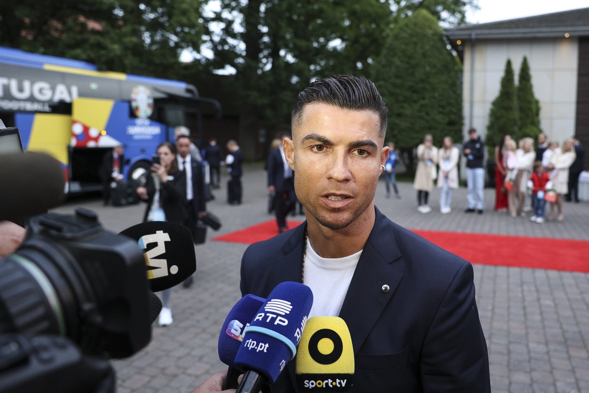 Portugal national soccer team player Cristiano Ronaldo talks to the press after arriving to Harsewinkel, Germany, 13 June 2024. The Portuguese national soccer team is based in Harsewinkel during the UEFA EURO 2024. MIGUEL A. LOPES/LUSA