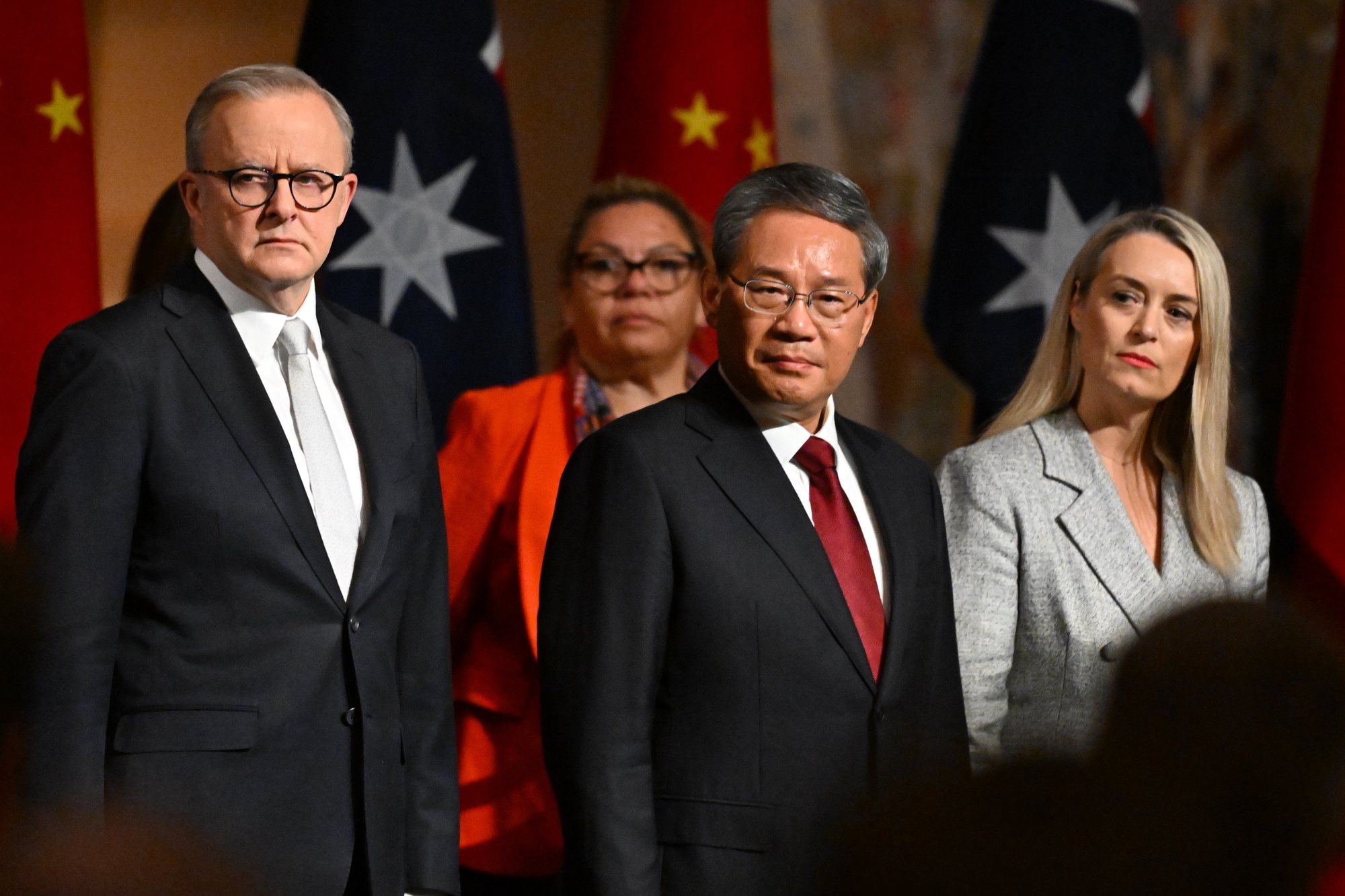epa11416951 Chinese Premier Li Qiang (C), Australian Prime Minister Anthony Albanese (L) and his fiancée Jodie Haydon (R) attend an official lunch at the Australian Parliament House in Canberra, Australia, 17 June 2024. Li Qiang, who is second only to President Xi Jinping, is on a four-day visit to Australia.  EPA/LUKAS COCH AUSTRALIA AND NEW ZEALAND OUT