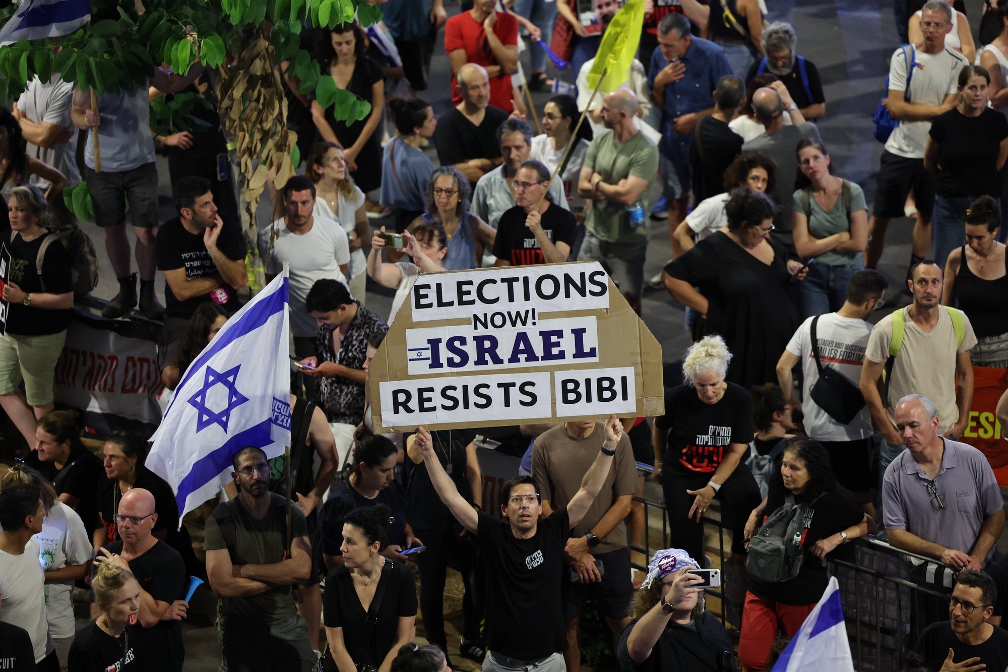 epaselect epa11413528 People calling on the Israeli war cabinet to sign a hostage deal take part in a protest rally outside the Kirya military headquarters in Tel Aviv, Israel, 15 June 2024. According to the Israeli defense forces, around 120 Israelis hostages are still held by Hamas in Gaza. More than 36,000 Palestinians and over 1,400 Israelis have been killed, according to the Palestinian Health Ministry and the Israel Defense Forces (IDF), since Hamas militants launched an attack against Israel from the Gaza Strip on 07 October 2023, and the Israeli operations in Gaza and the West Bank which followed it.  EPA/ABIR SULTAN