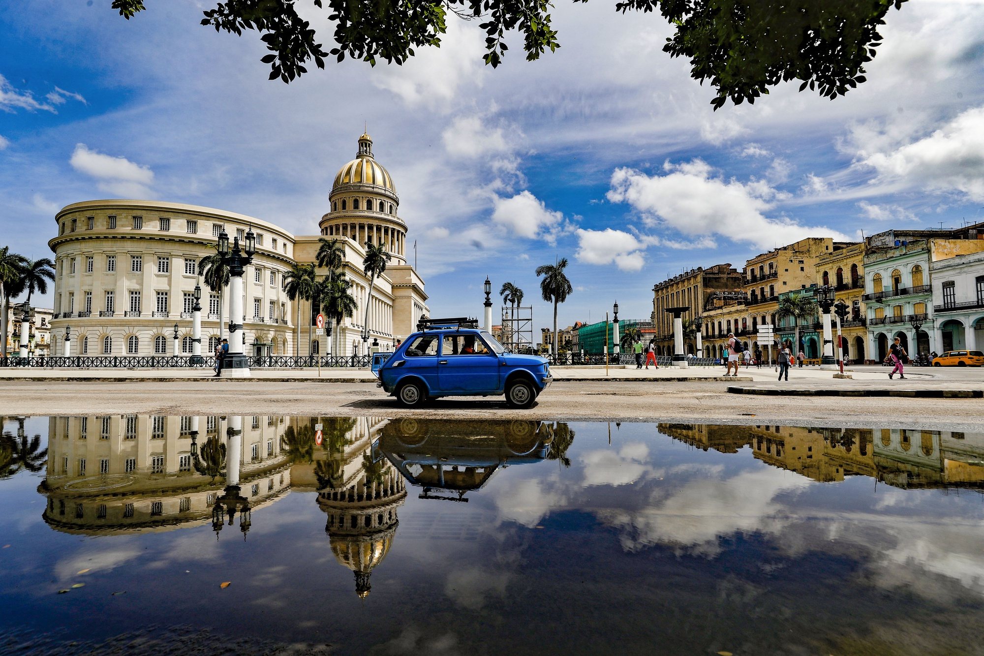 epa11423696 A car drives near the Capitol in Havana, Cuba, 19 June 2024.  EPA/YANDER ZAMORA
