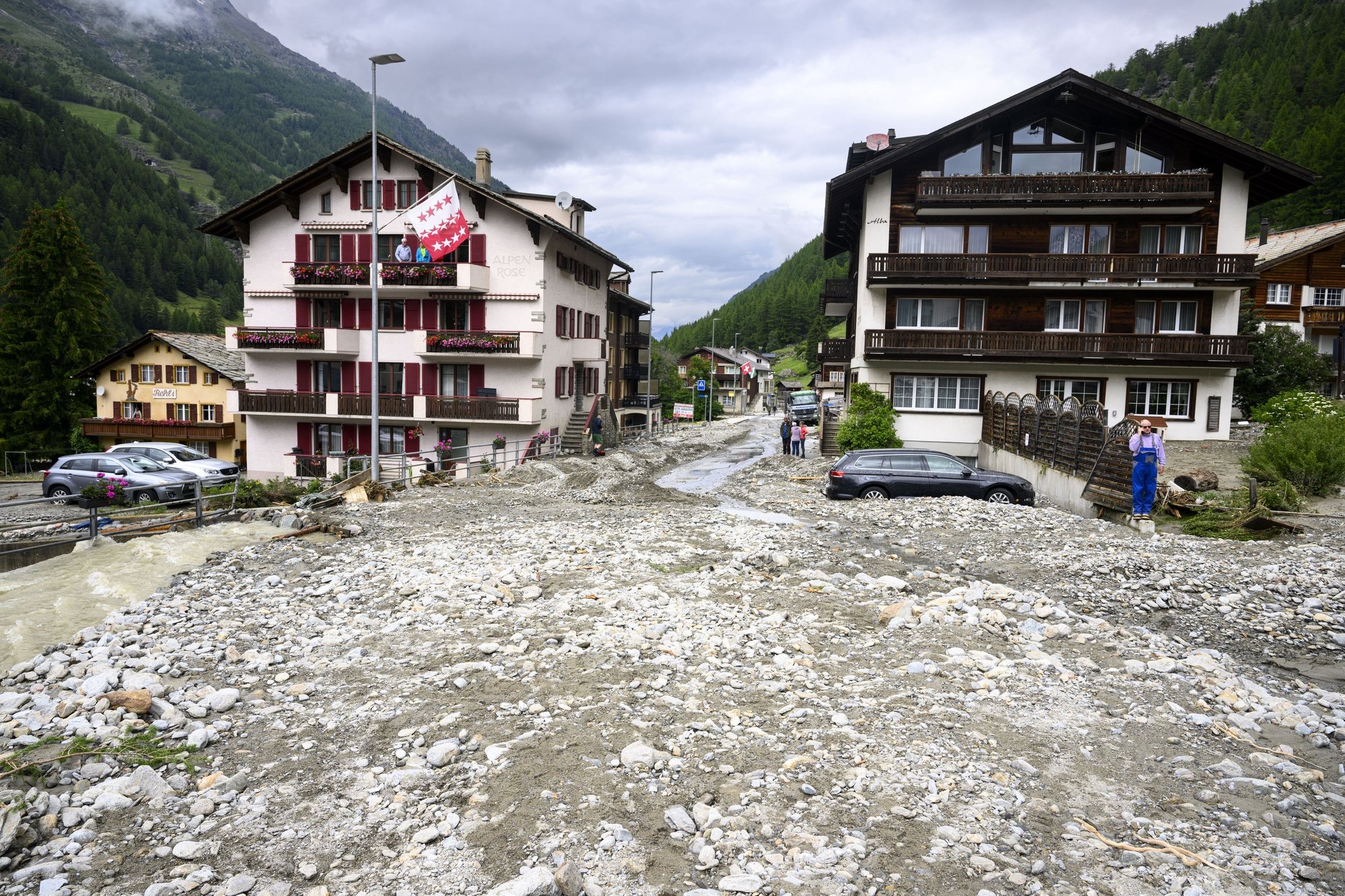 epa11447156 General view of rubble from a landslide following storms that caused major flooding in Saas-Grund, Switzerland, 30 June 2024. Massive thunderstorms and rainfall led to a flooding situation with large-scale landslides.  EPA/JEAN-CHRISTOPHE BOTT