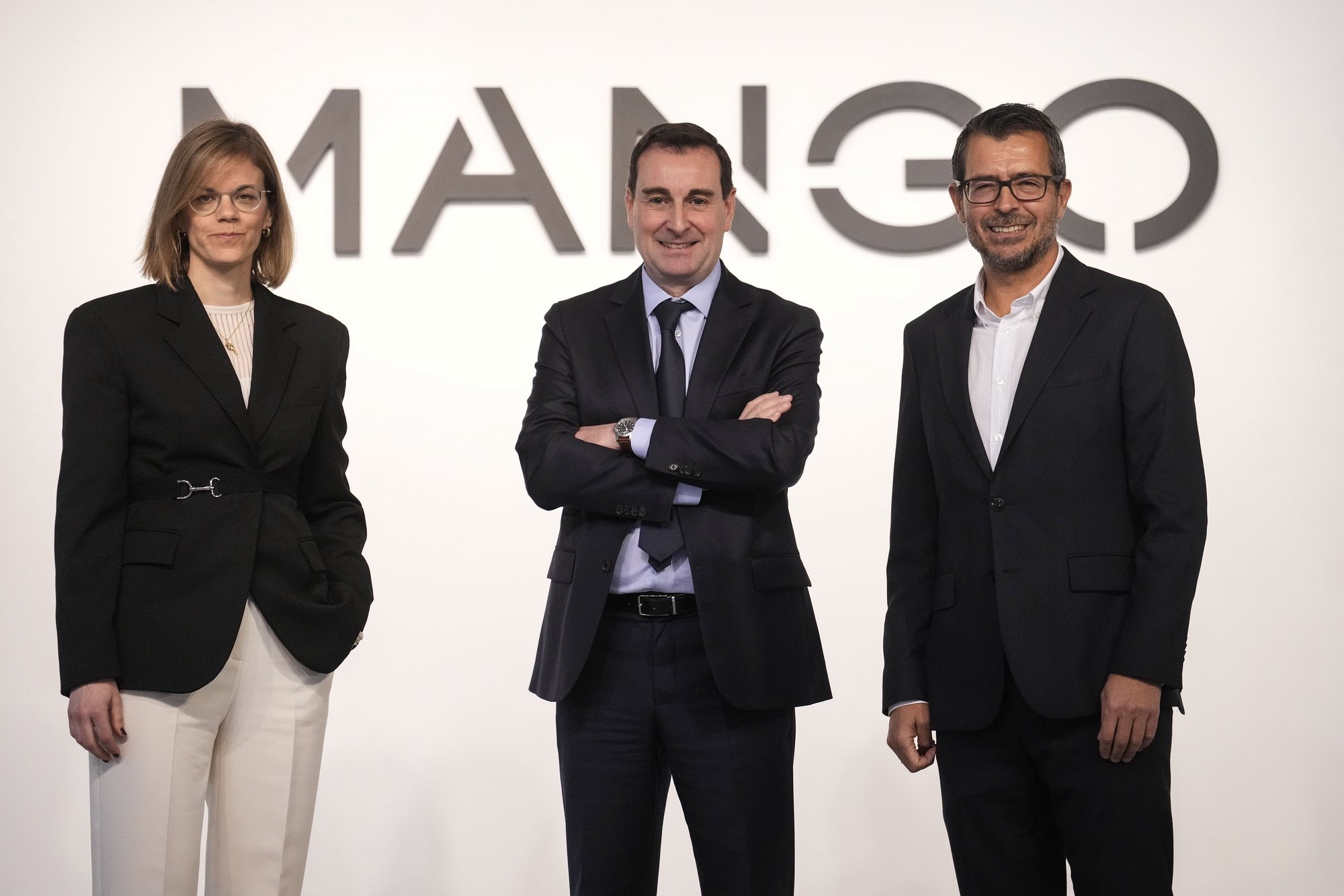 epa11214030 Spanish retailer Mango&#039;s CEO Toni Ruiz (C), Finance Director Margarita Salvans (L) and Global Retail Director Cesar de Vicente (R) pose during the presentation of the company&#039;s 2023 results at their headquarters in Barcelona, Spain, 11 March 2024. According to Mango, the company registered a rise in sales up to a 3.1 billion euros with a benefit of 172.1 million euros, a record for the company.  EPA/ENRIC FONTCUBERTA