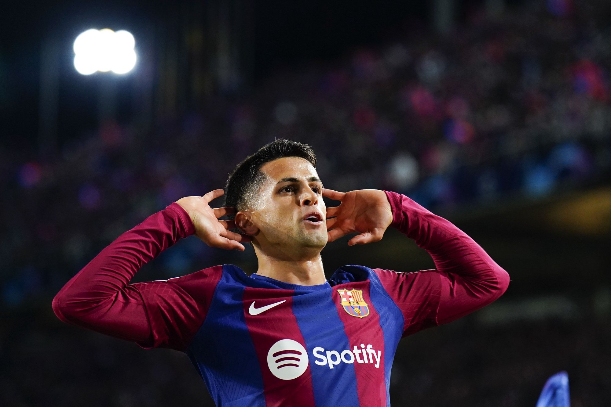 epa11217239 Barcelona&#039;s Joao Cancelo celebrates after scoring the 2-0 goal during the UEFA Champions League round of 16 second leg soccer match between FC Barcelona and SSC Napoli, in Barcelona, Catalonia, Spain, 12 March 2024.  EPA/Siu Wu