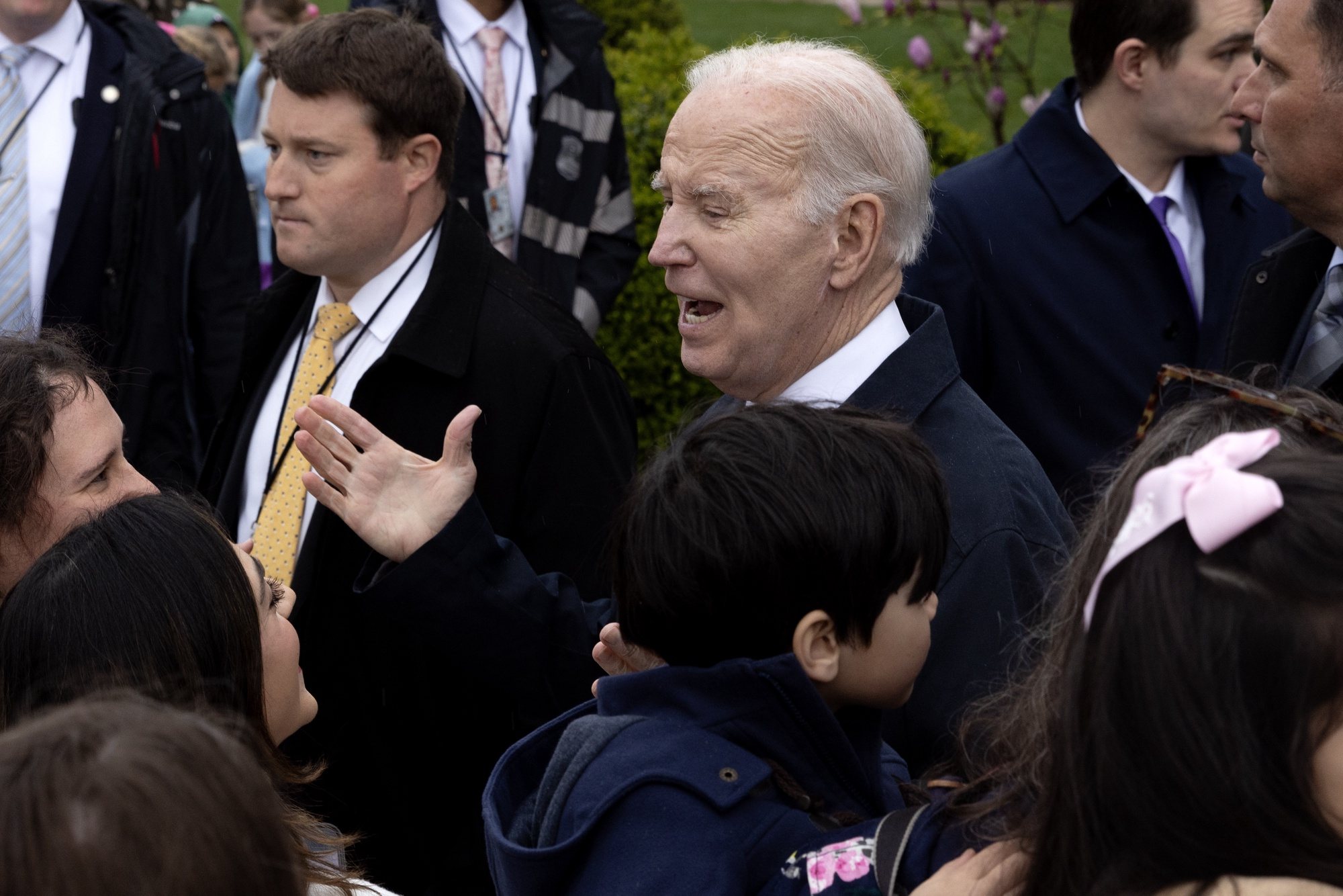 epa11254815 US President Joe Biden (C) greets visitors during the 2024 Easter Egg Roll on the South Lawn of the White House in Washington, DC, USA, 01 April 2024. About forty thousand people were expected to attend the 2024 Easter Egg Roll, which continues the theme of &#039;EGGucation&#039; and provides a variety of learning activities for children.  EPA/MICHAEL REYNOLDS / POOL