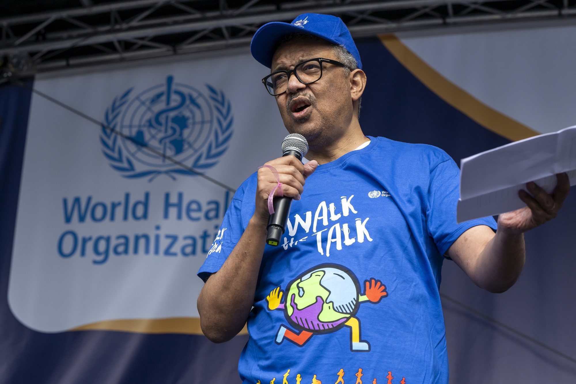epa11371197 Tedros Adhanom Ghebreyesus, Director General of the World Health Organization (WHO), speaks during WHO&#039;s &quot;Walk the Talk&quot; 5th edition, in Geneva, Switzerland, 26 May 2024. The Walk the Talk: Health for All Challenge was held in Geneva to provide a healthy kickstart to the Seventy-seventh World Health Assembly.  EPA/MARTIAL TREZZINI