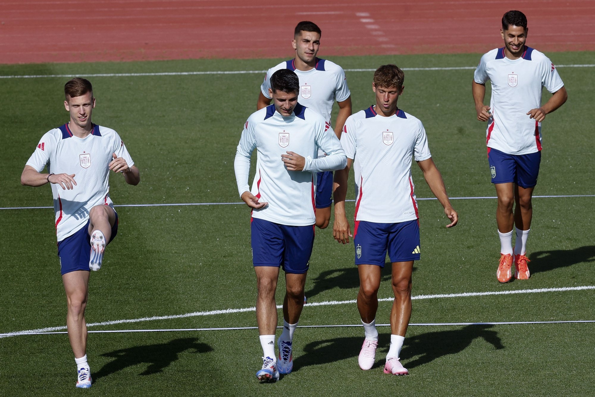 epa11384054 Spain&#039;s Ferran Torres (back), Alvaro Morata (2-L), Marcos Llorente (2-R) and Dani Olmo (L) attend a training session of the national team in Madrid, Spain, 01 June 2024. The Spanish national soccer team prepares for the UEFA EURO 2024.  EPA/CHEMA MOYA