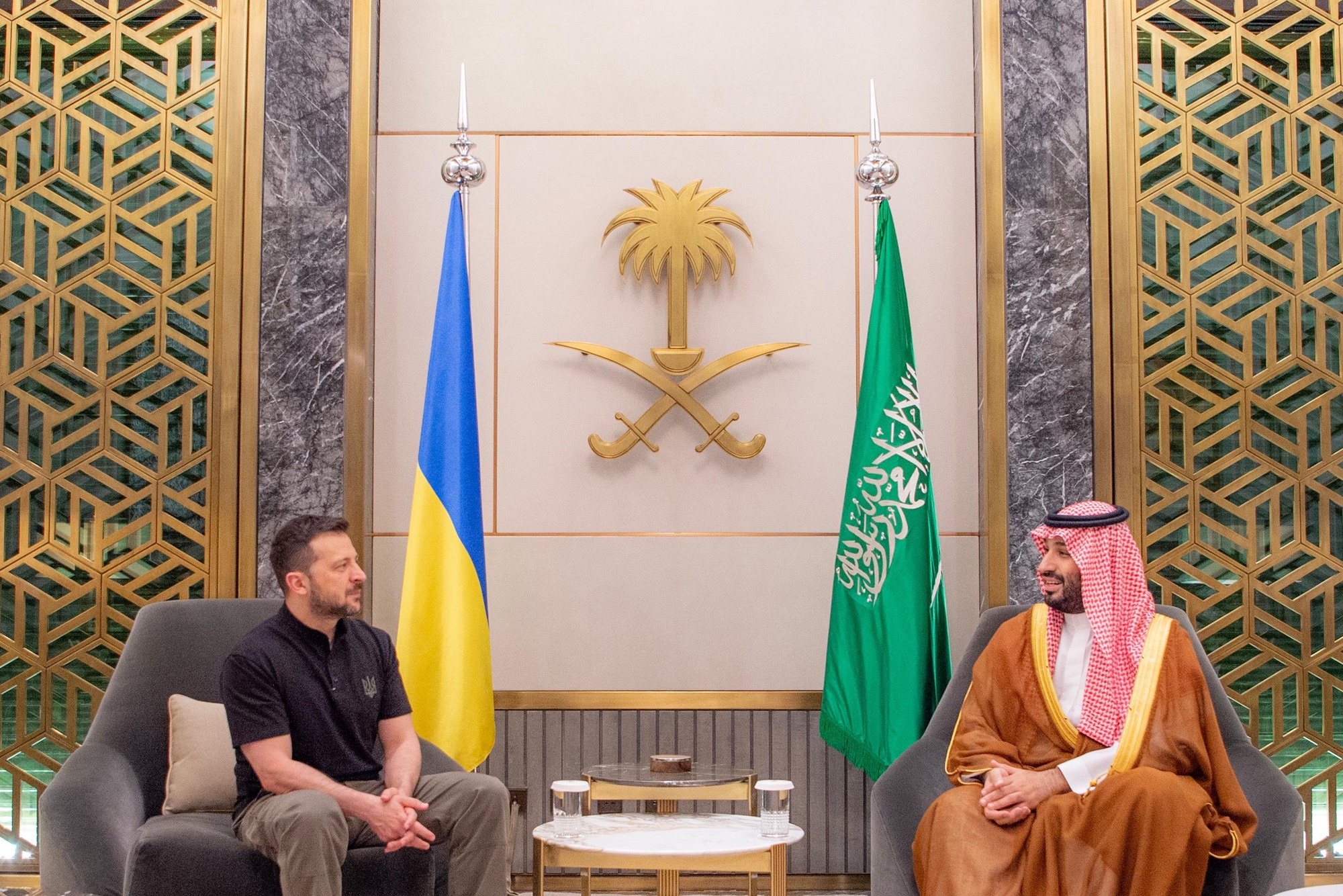 epa11406448 A handout photo made available by the Saudi Royal Palace shows Saudi Crown Prince Mohammed bin Salman (R) meeting with Ukrainian President Volodymyr Zelensky in Jeddah, Saudi Arabia, 12 June 2024. The Ukrainian president is on an official visit to Saudi Arabia, where he met the Saudi Crown Prince to discuss bilateral relations between the two countries as well as the preparation for the upcoming Swiss Summit on Peace in Ukraine, among other topics, the Ukrainian presidential office said.  EPA/BANDAR ALJALOUD/SAUDI ROYAL PALACE HANDOUT -- MANDATORY CREDIT --  HANDOUT EDITORIAL USE ONLY/NO SALES HANDOUT EDITORIAL USE ONLY/NO SALES