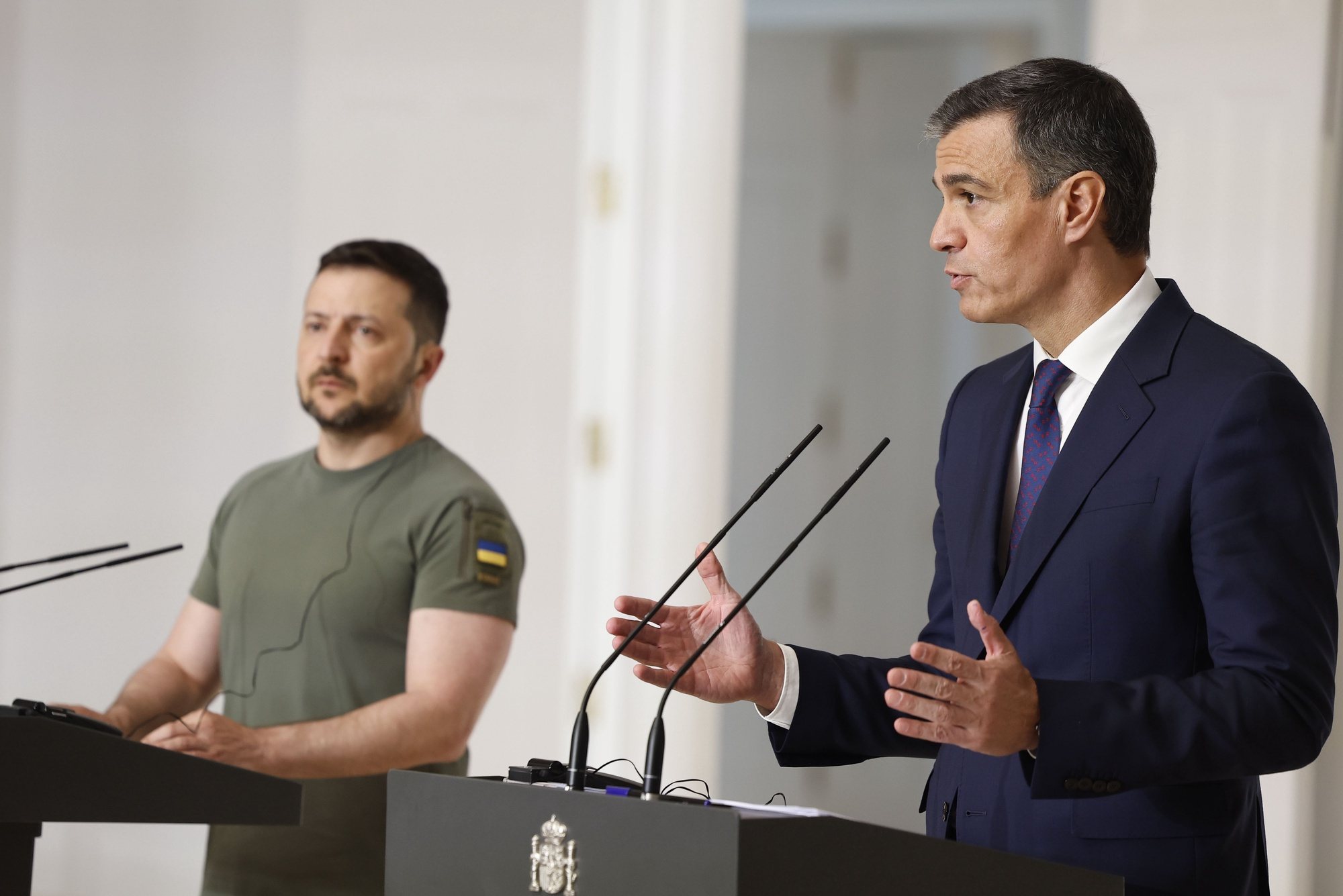 epa11373464 Spanish Prime Minister Pedro Sanchez (R) and Ukrainian President Volodymyr Zelensky address a joint press conference after their meeting at La Moncloa Palace, in Madrid, Spain, 27 May 2024.  EPA/CHEMA MOYA