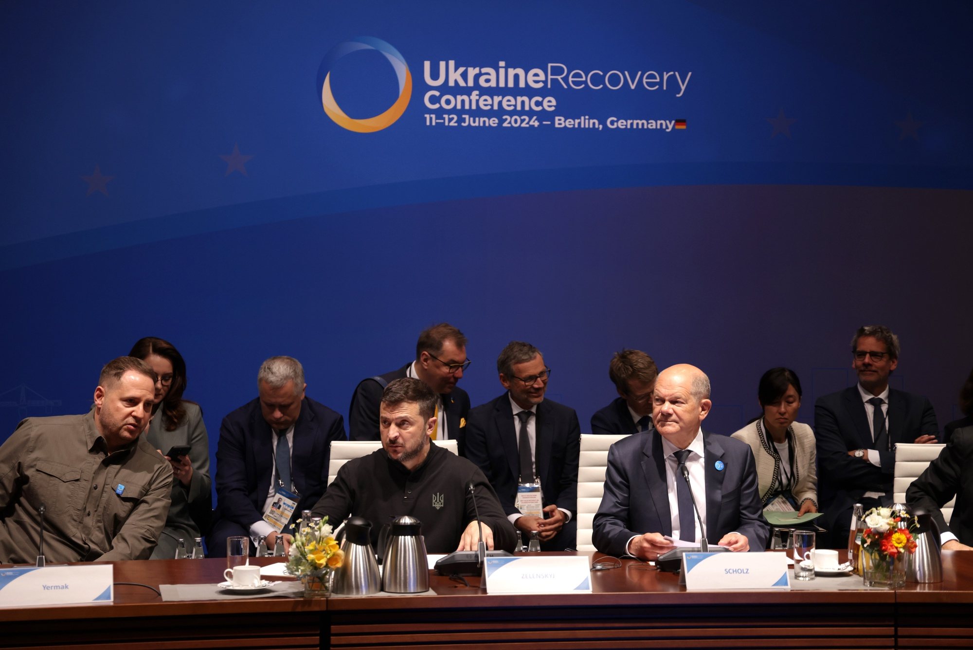 epa11403467 Ukrainian President Volodymyr Zelensky (C) German Chancellor Olaf Scholz (R) attend the high-level segment at the Ukraine Recovery Conference 2024 in Berlin, Germany, 11 June 2024. The Ukraine Recovery Conference 2024 takes place in Berlin from 11 to 12 June 2024, under the slogan &#039;United in defense. United in recovery. Stronger together.&#039;  EPA/SEAN GALLUP / POOL